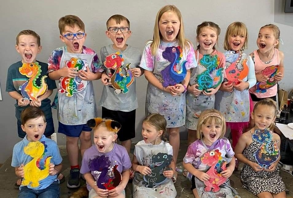 a group of children posing for a photo