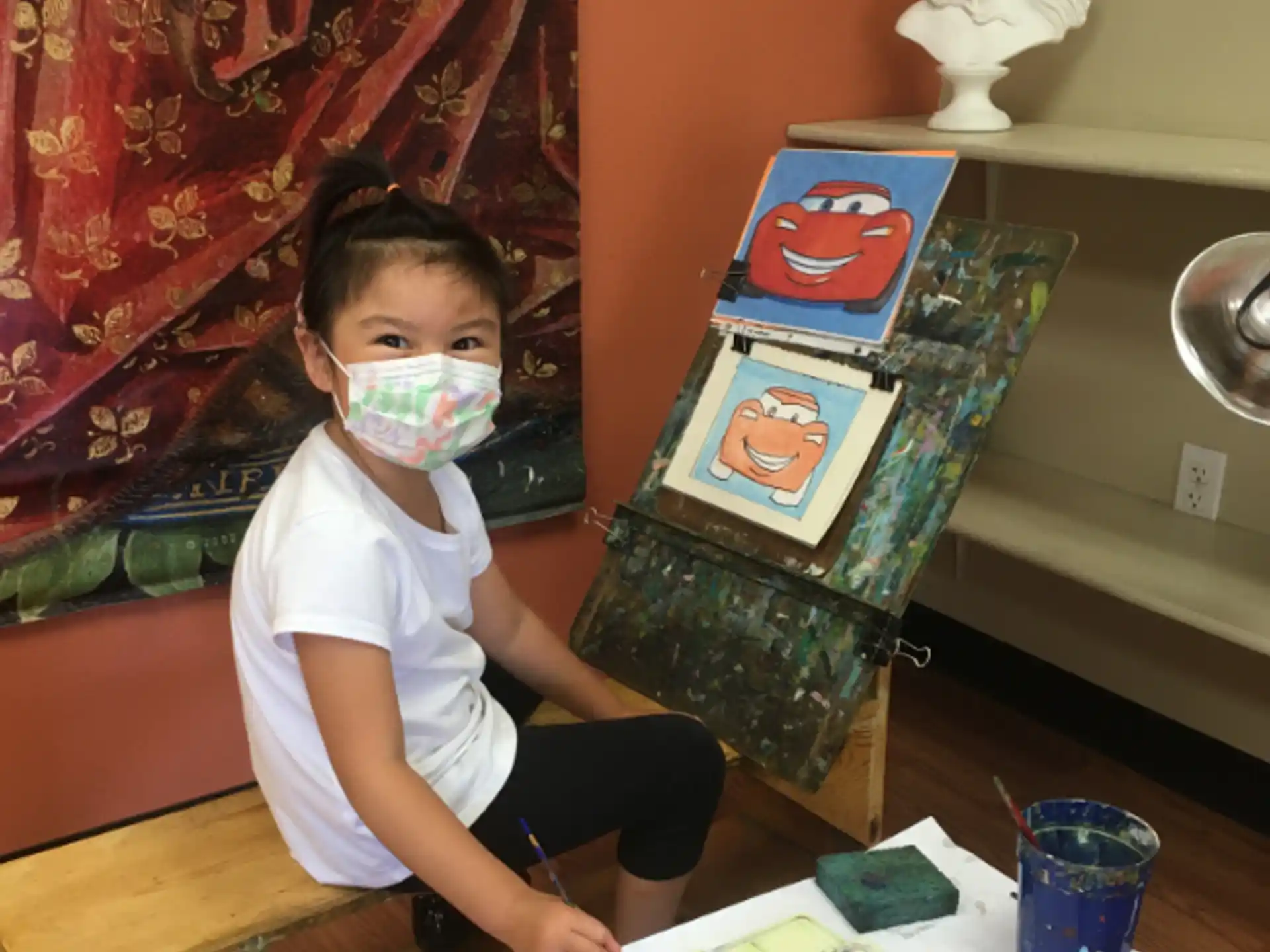 a child with a mask