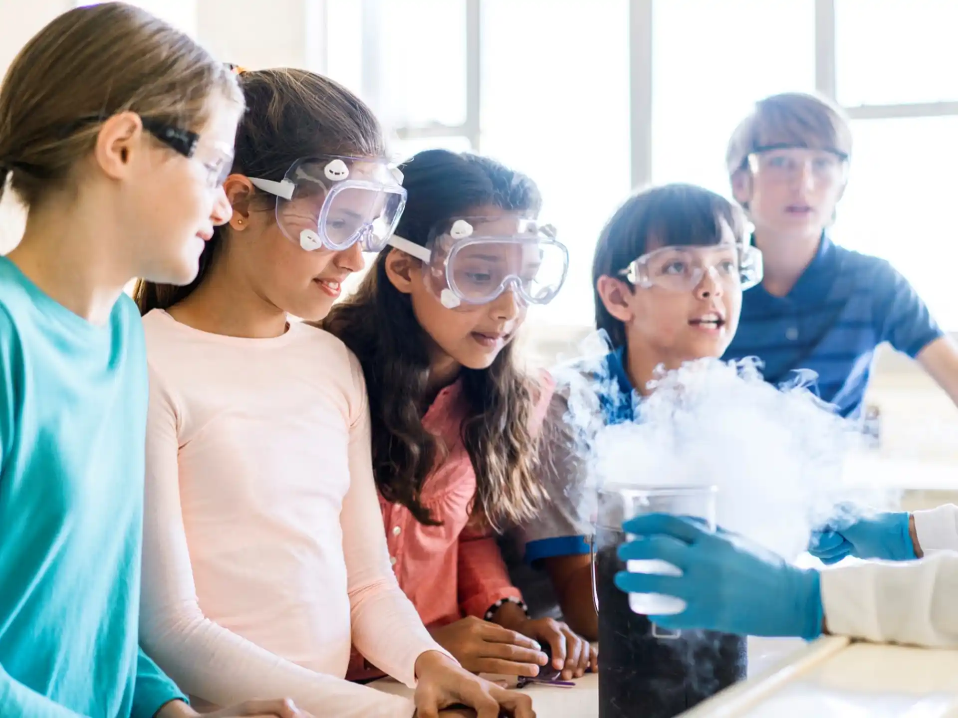 a group of people wearing safety goggles