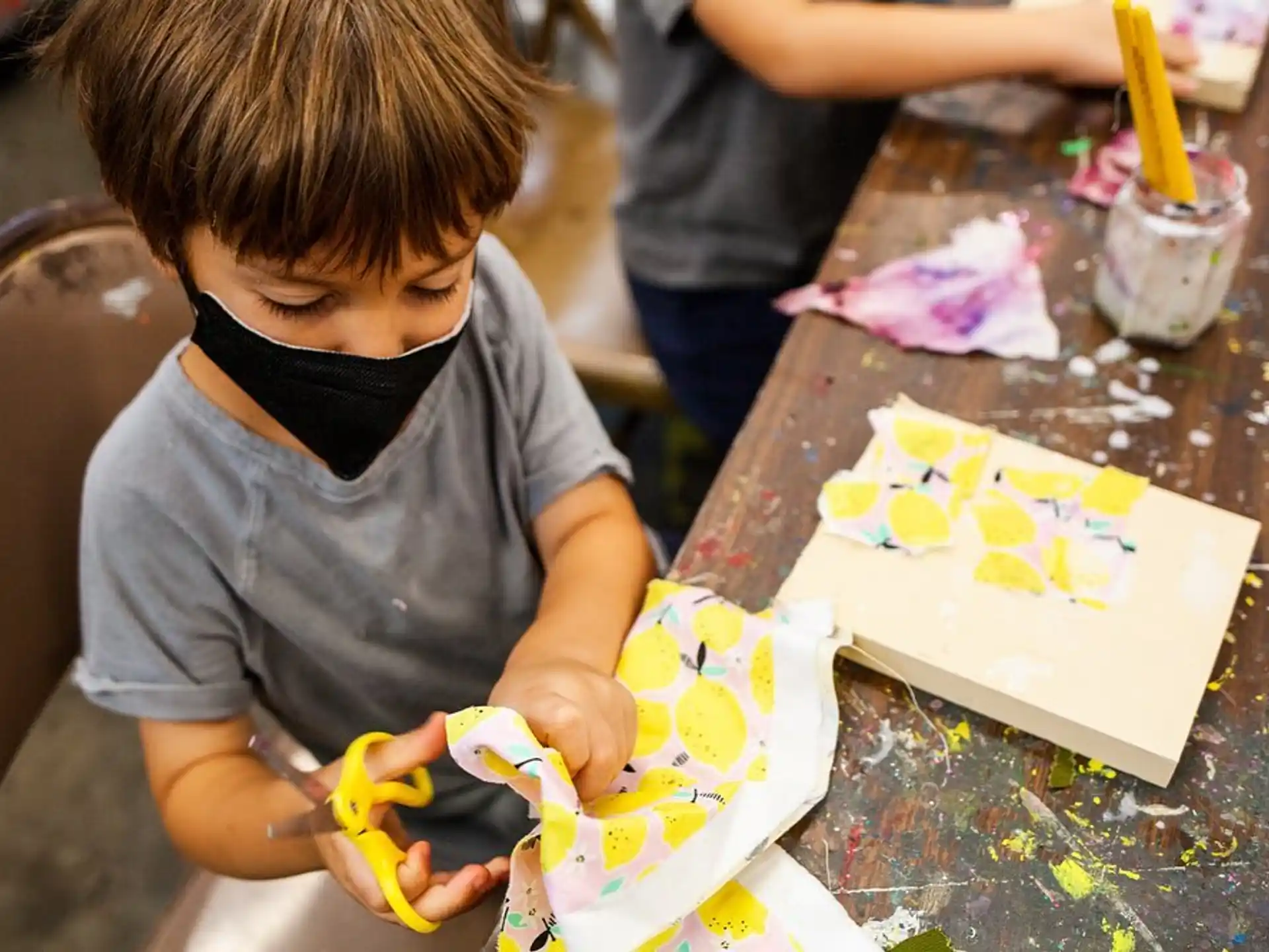 a young boy painting