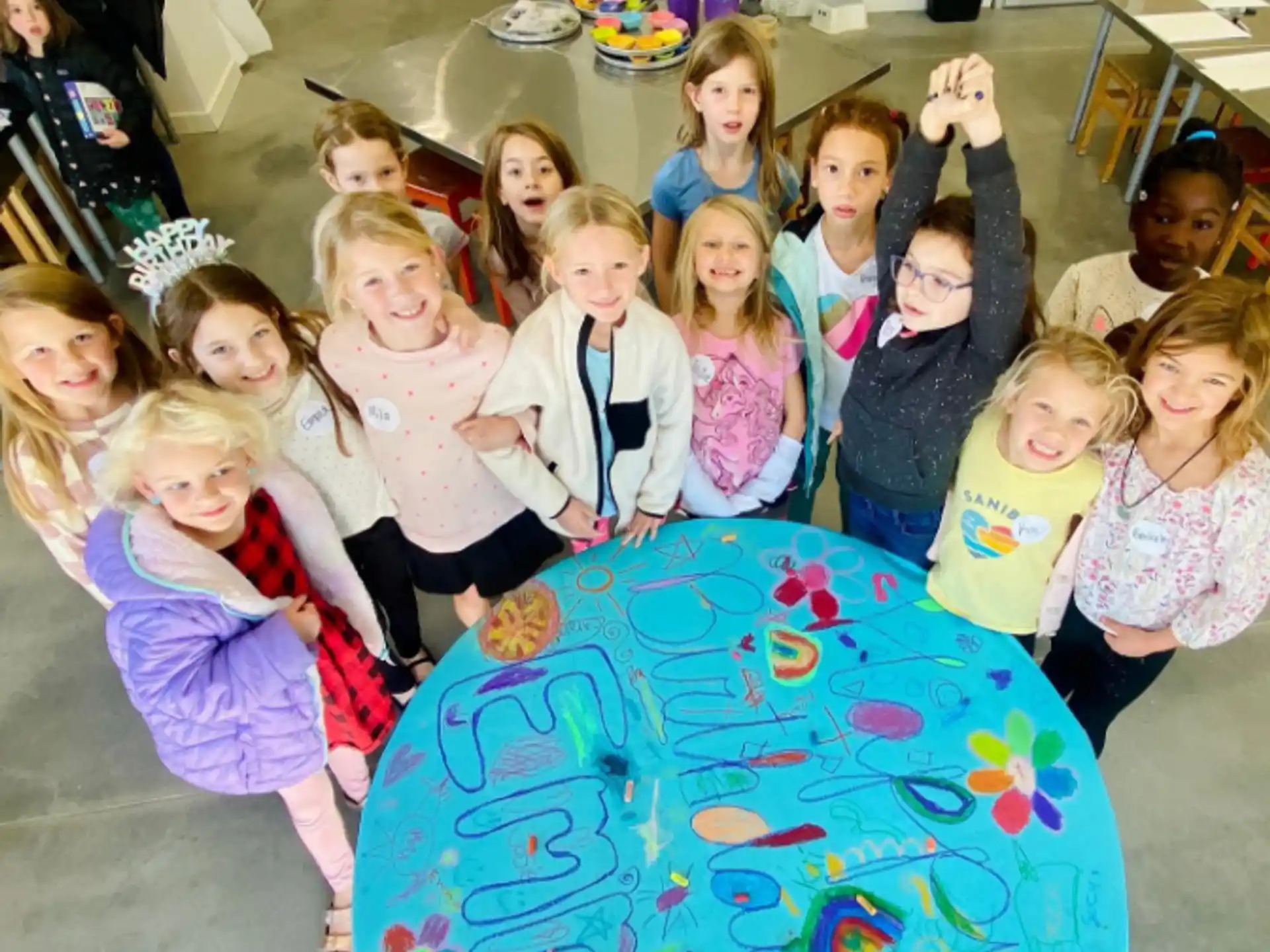 a group of children posing for a photo