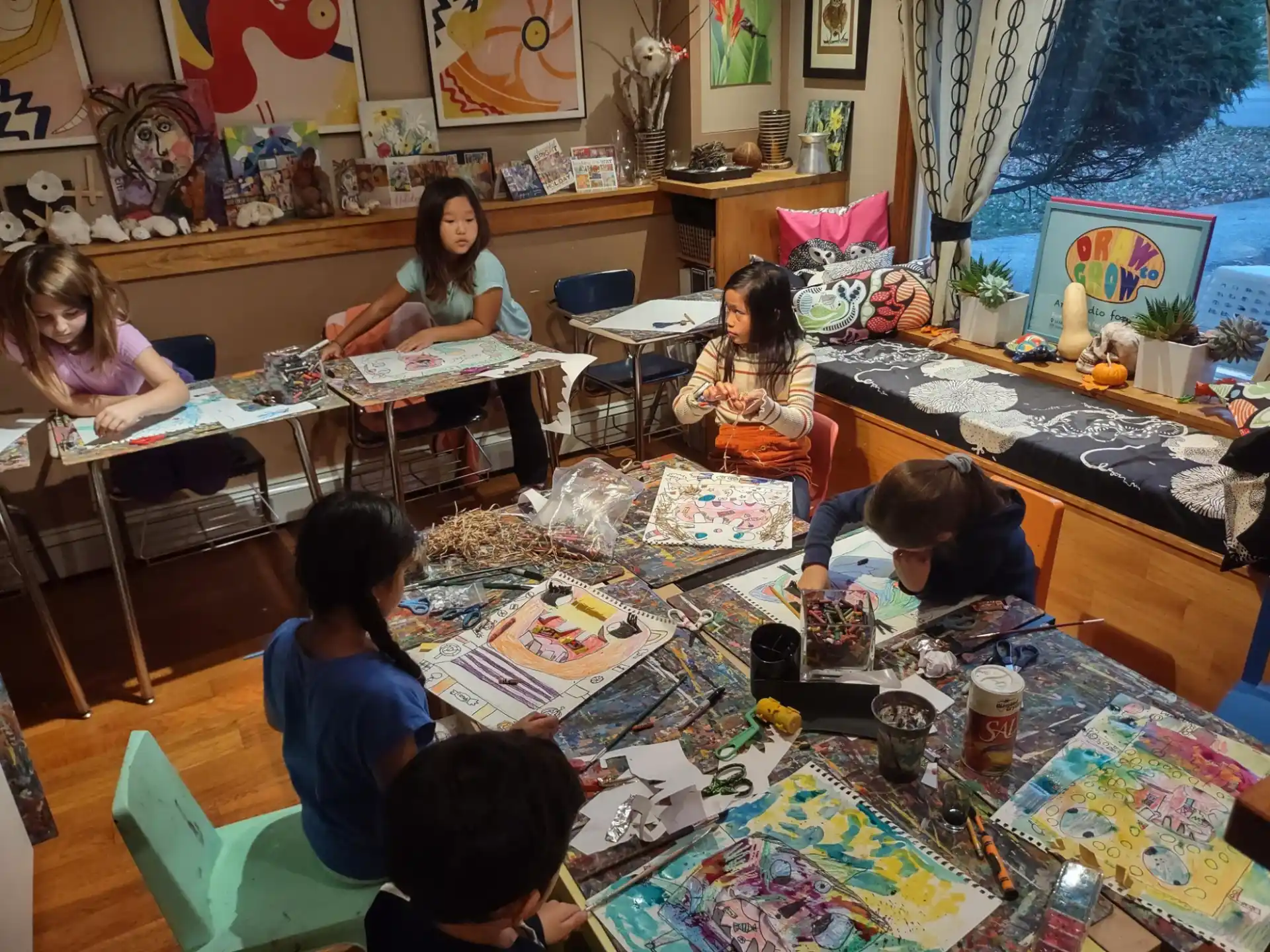 a group of people sitting around a table
