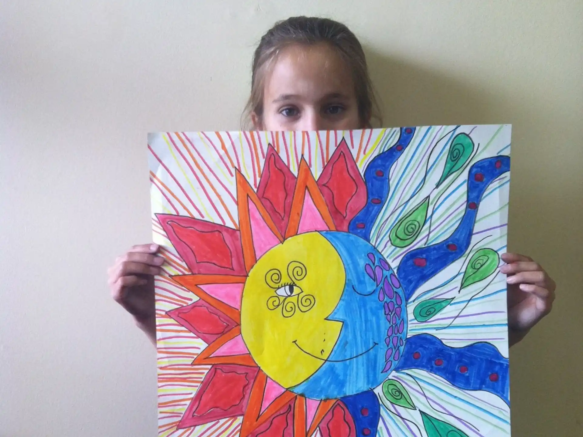 a child holding a flag