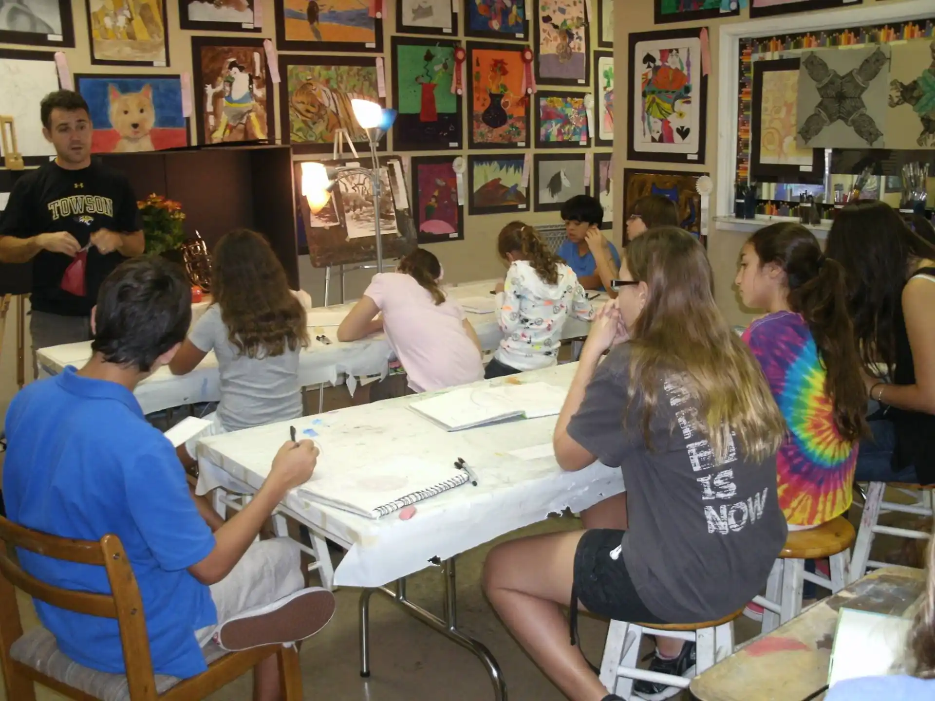 a group of people sitting around a table
