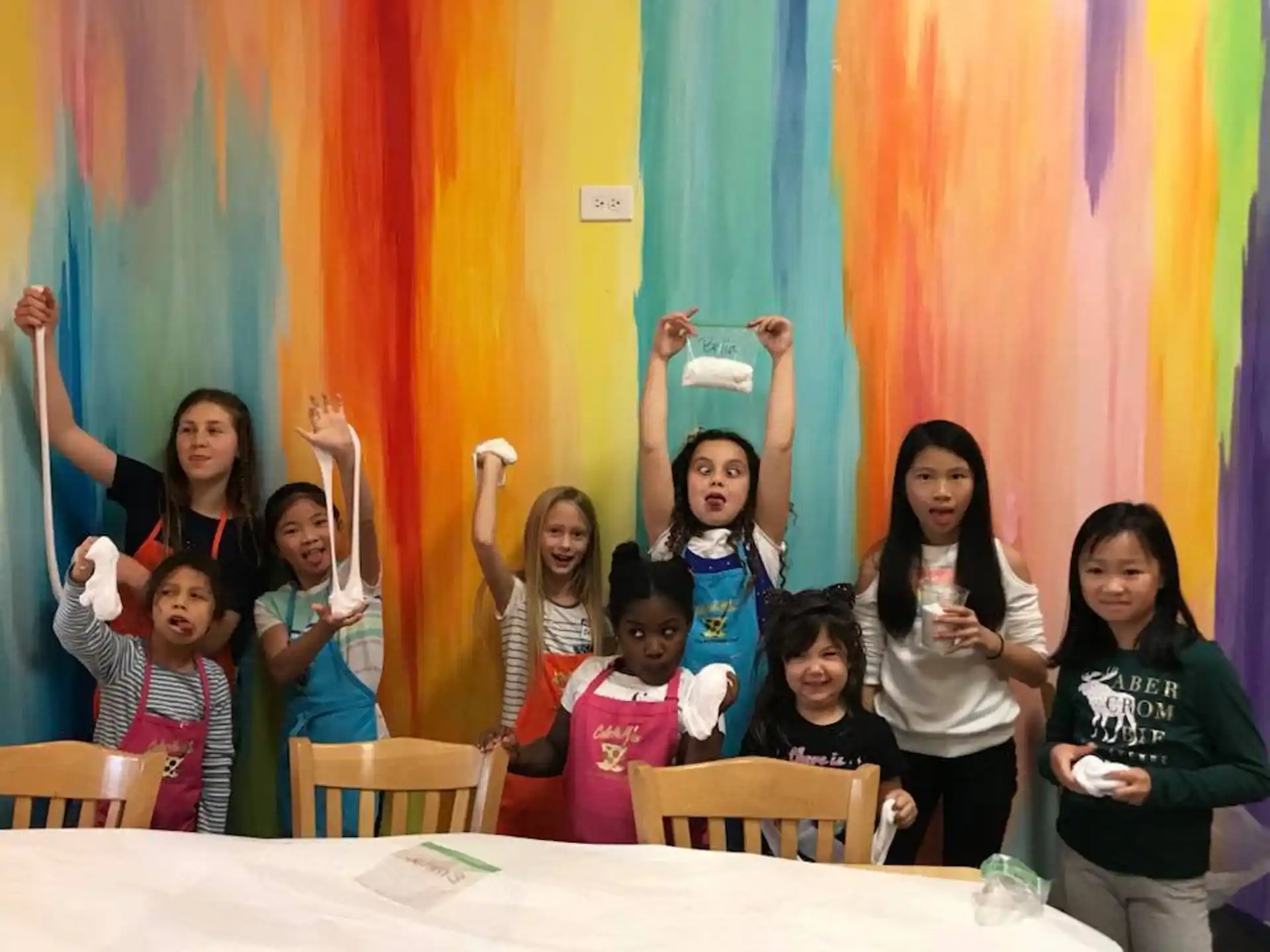 a group of girls posing for a photo