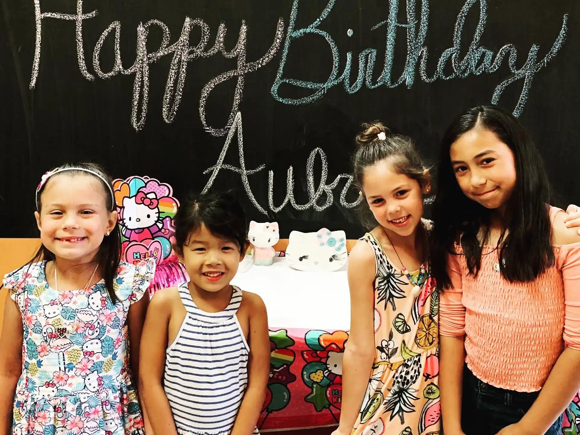 a group of girls posing for a picture