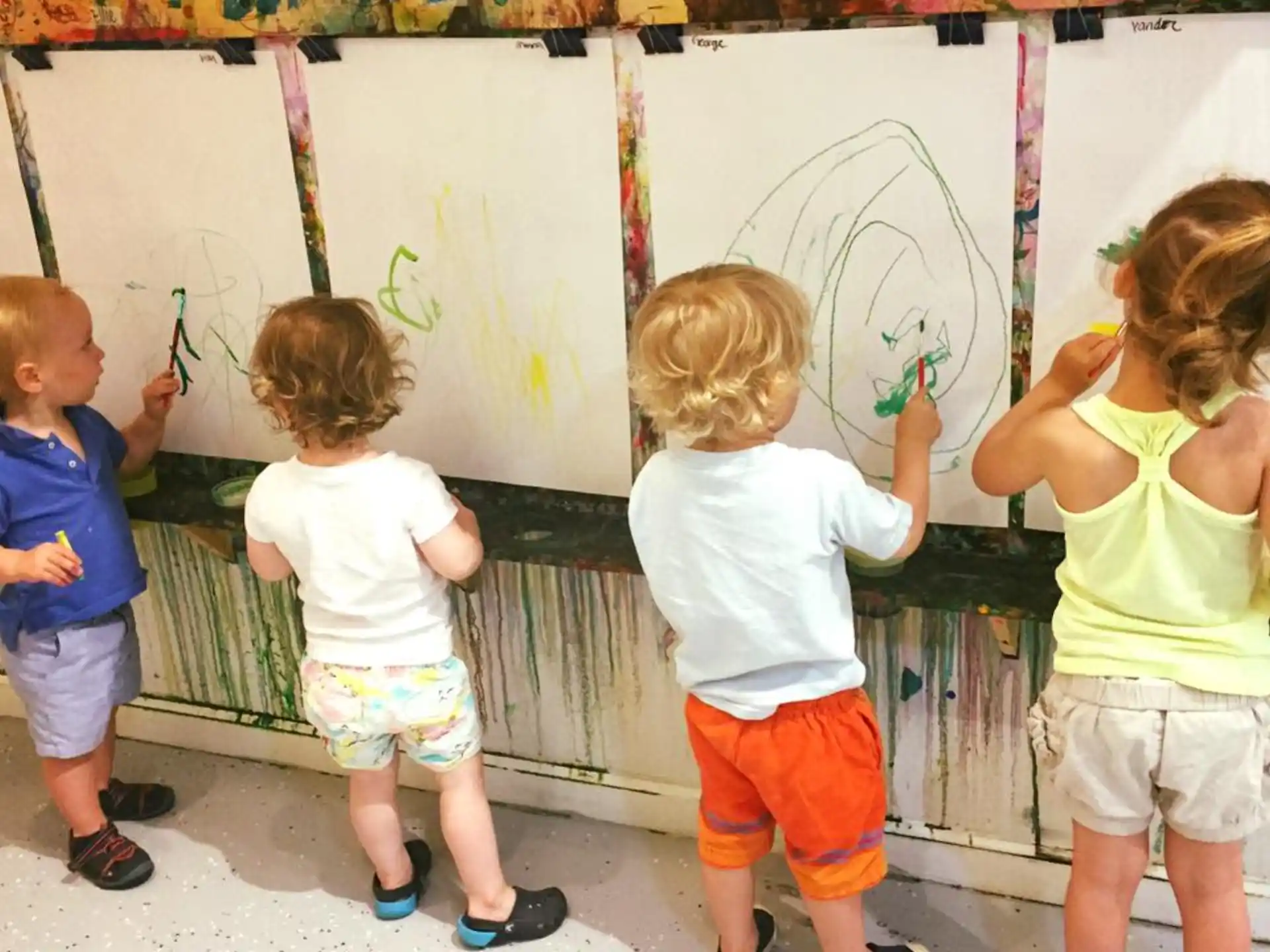 a group of children playing with toys