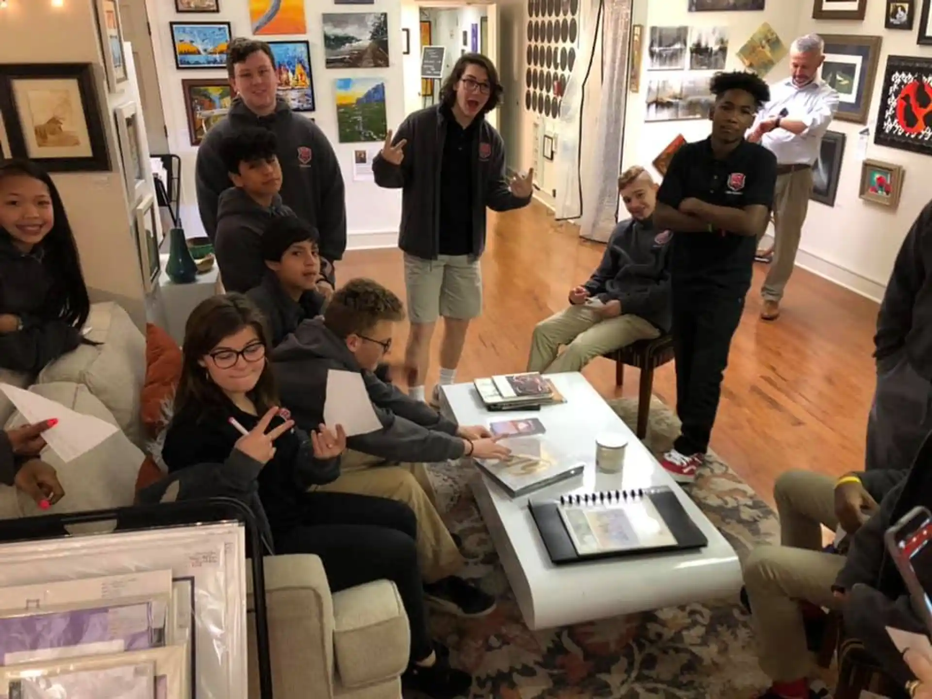 a group of people sitting in a room