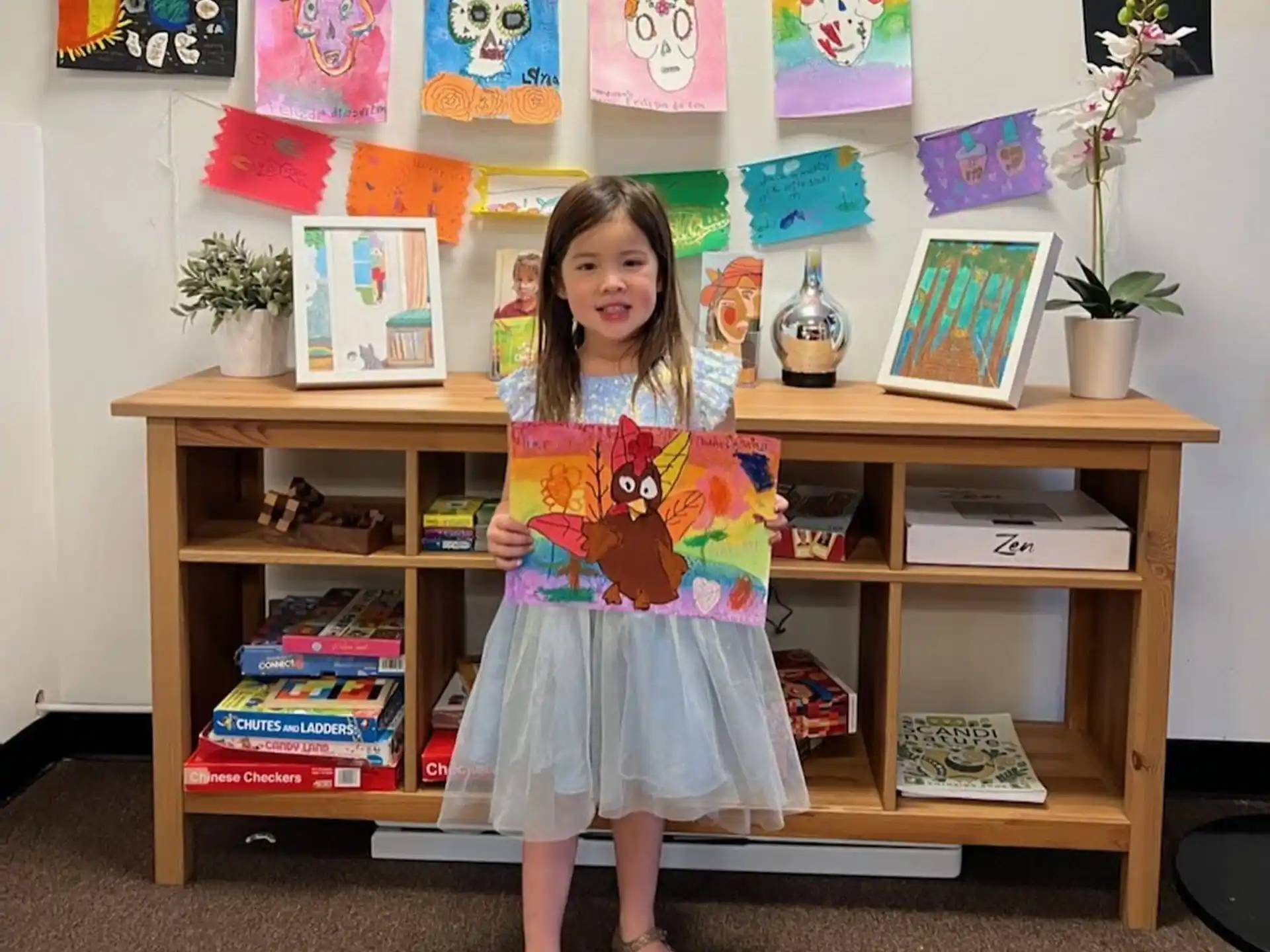 a girl holding a book