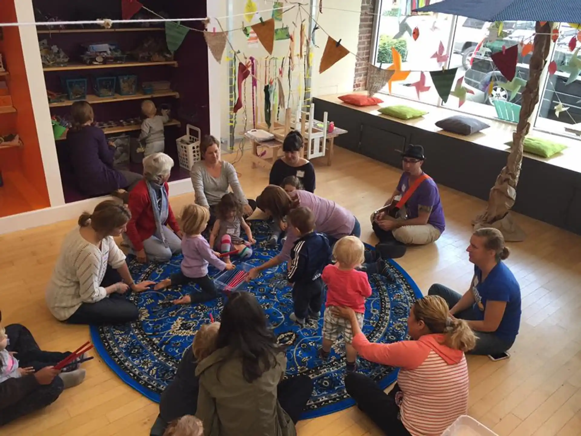 a group of people sitting on the floor