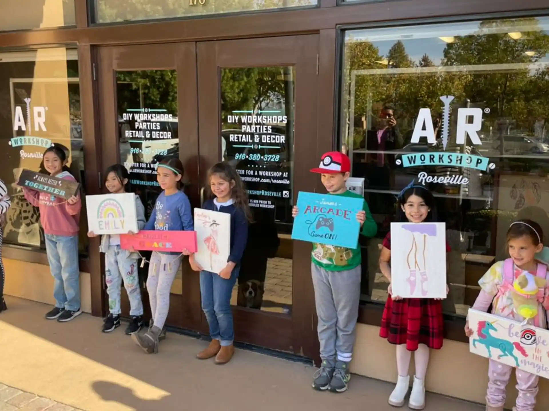 a group of people holding signs