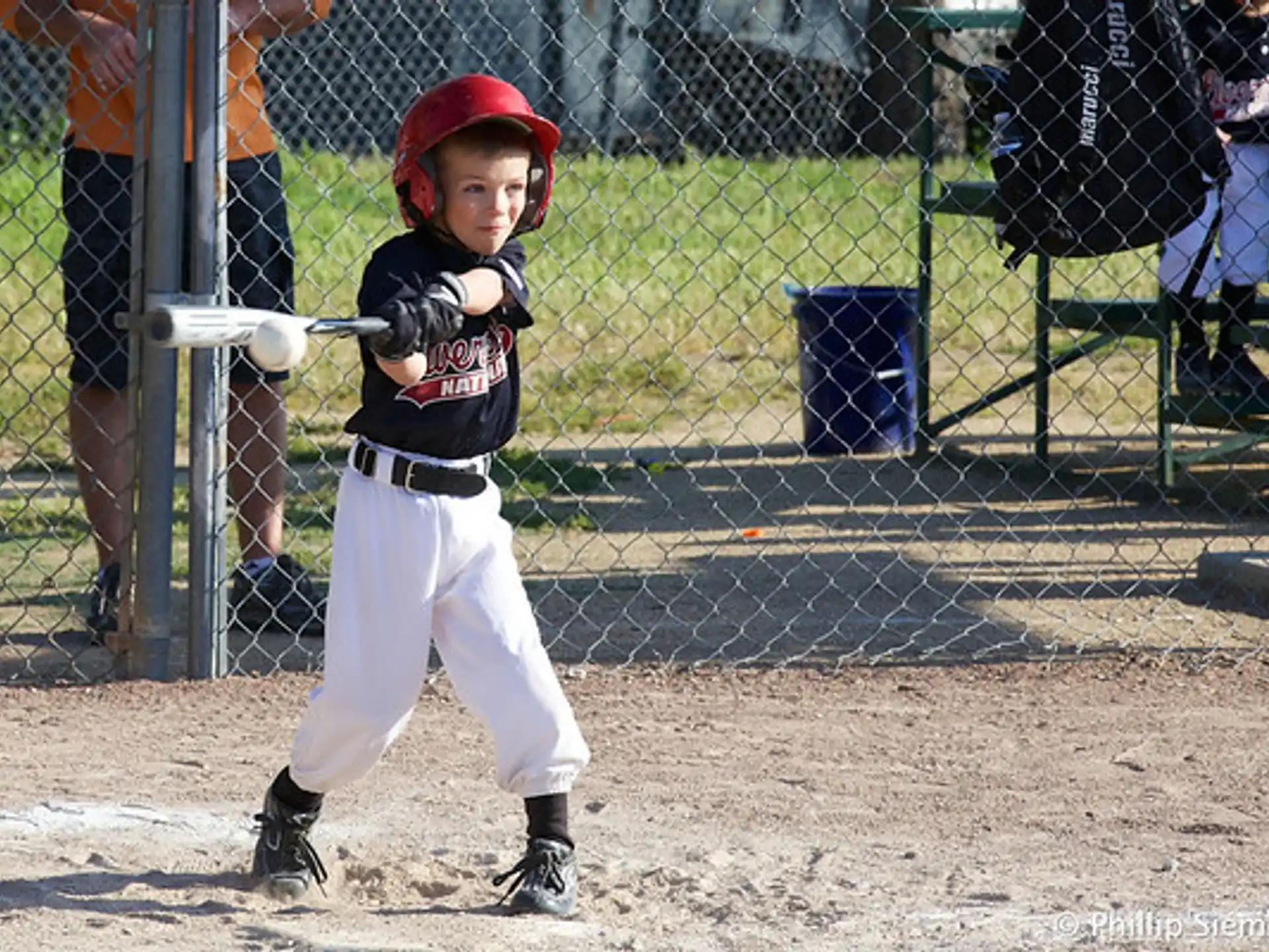 a young boy playing baseball