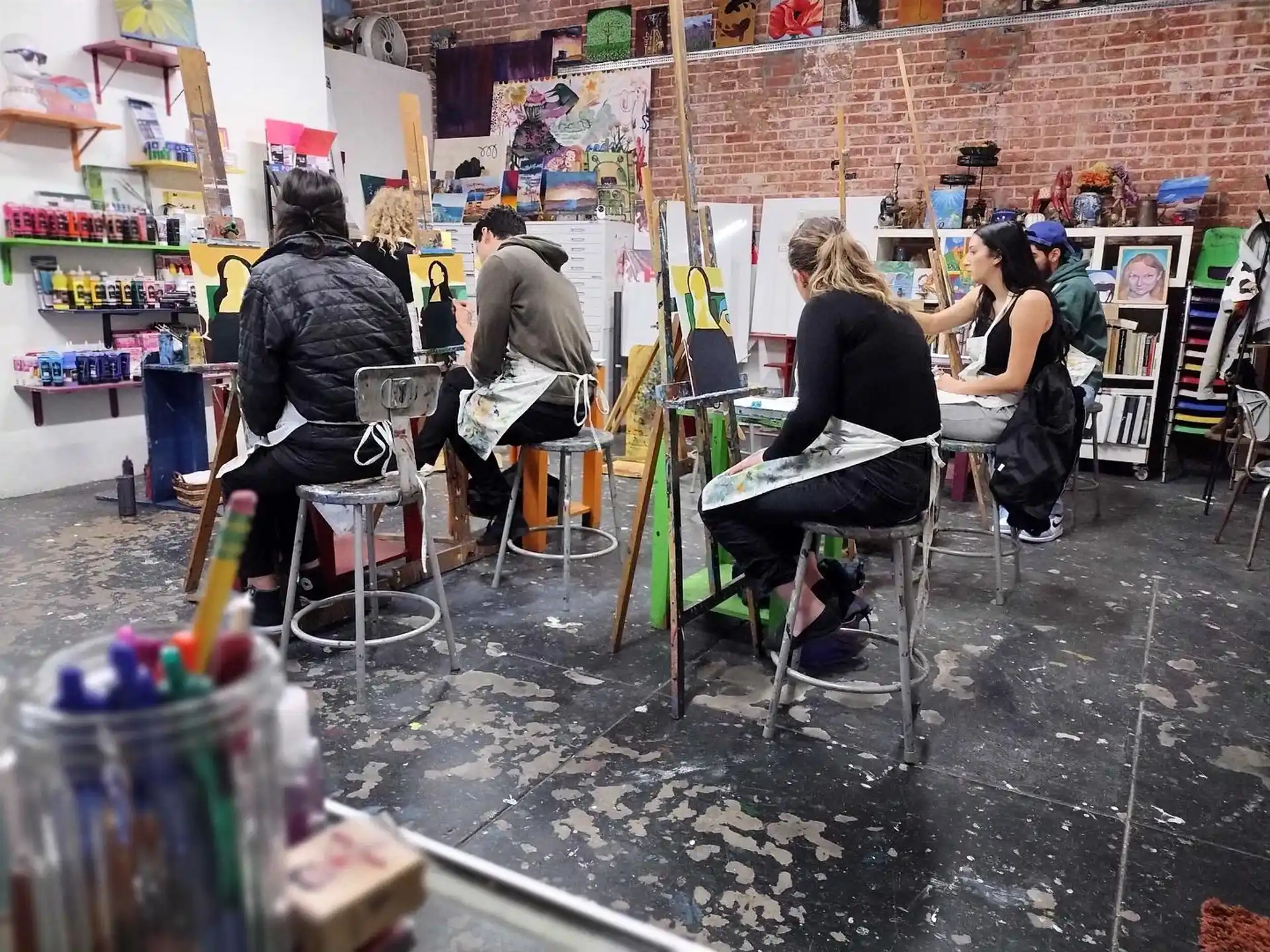 a group of people sitting at a table in a store