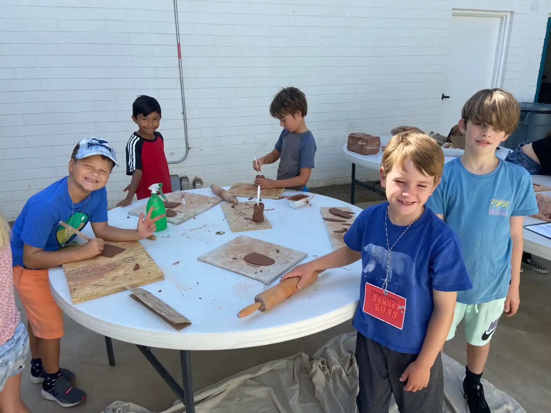 a group of boys playing a board game