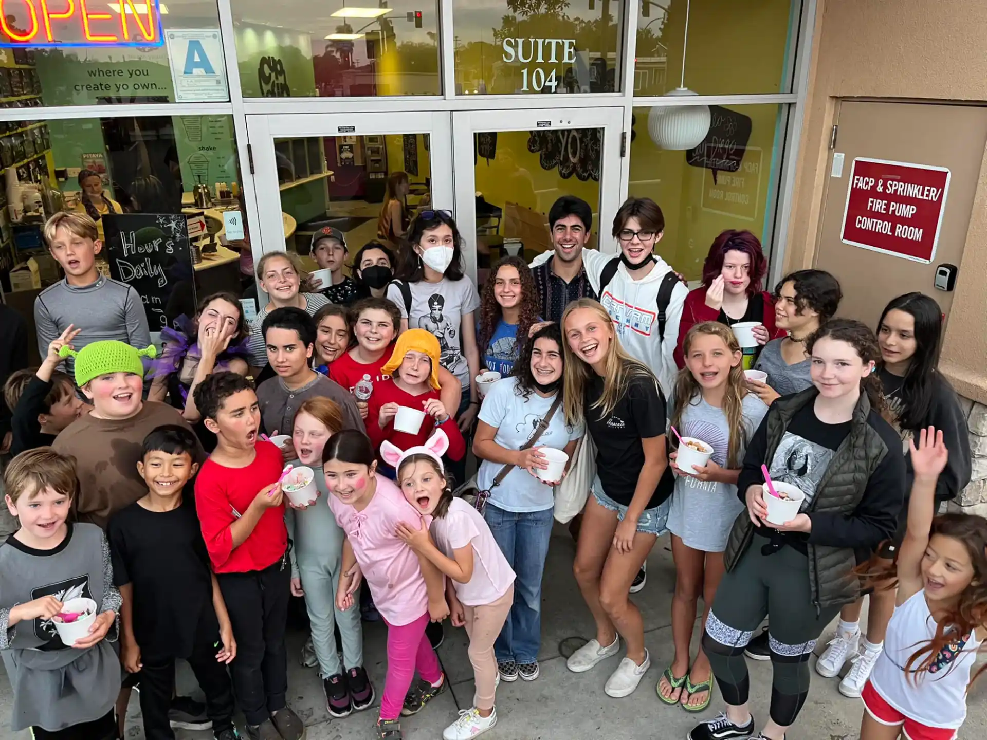 a group of people posing for a photo
