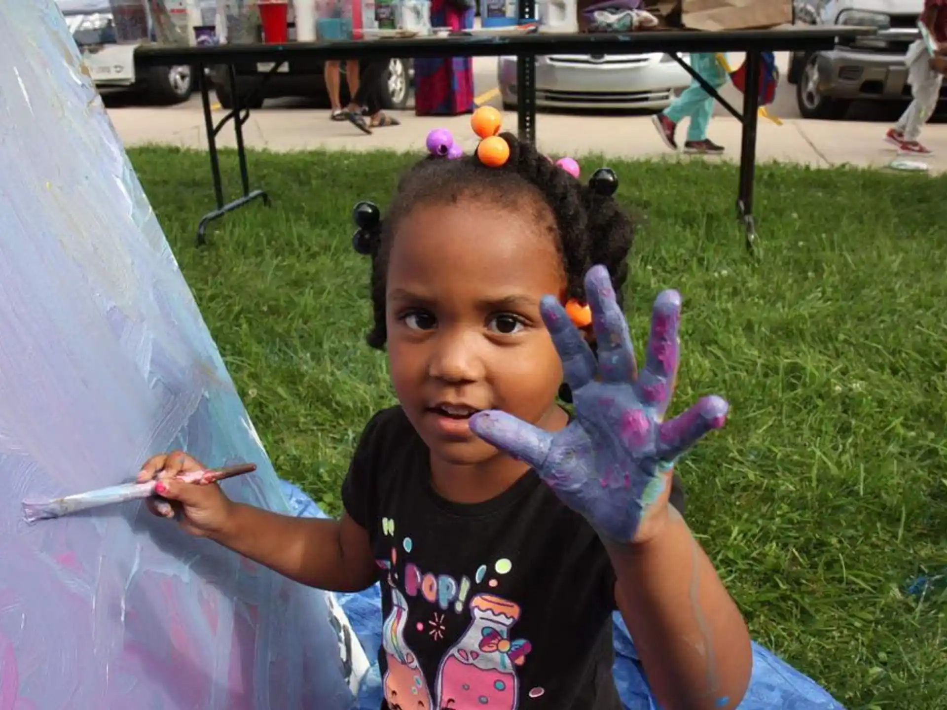 a child holding a toy