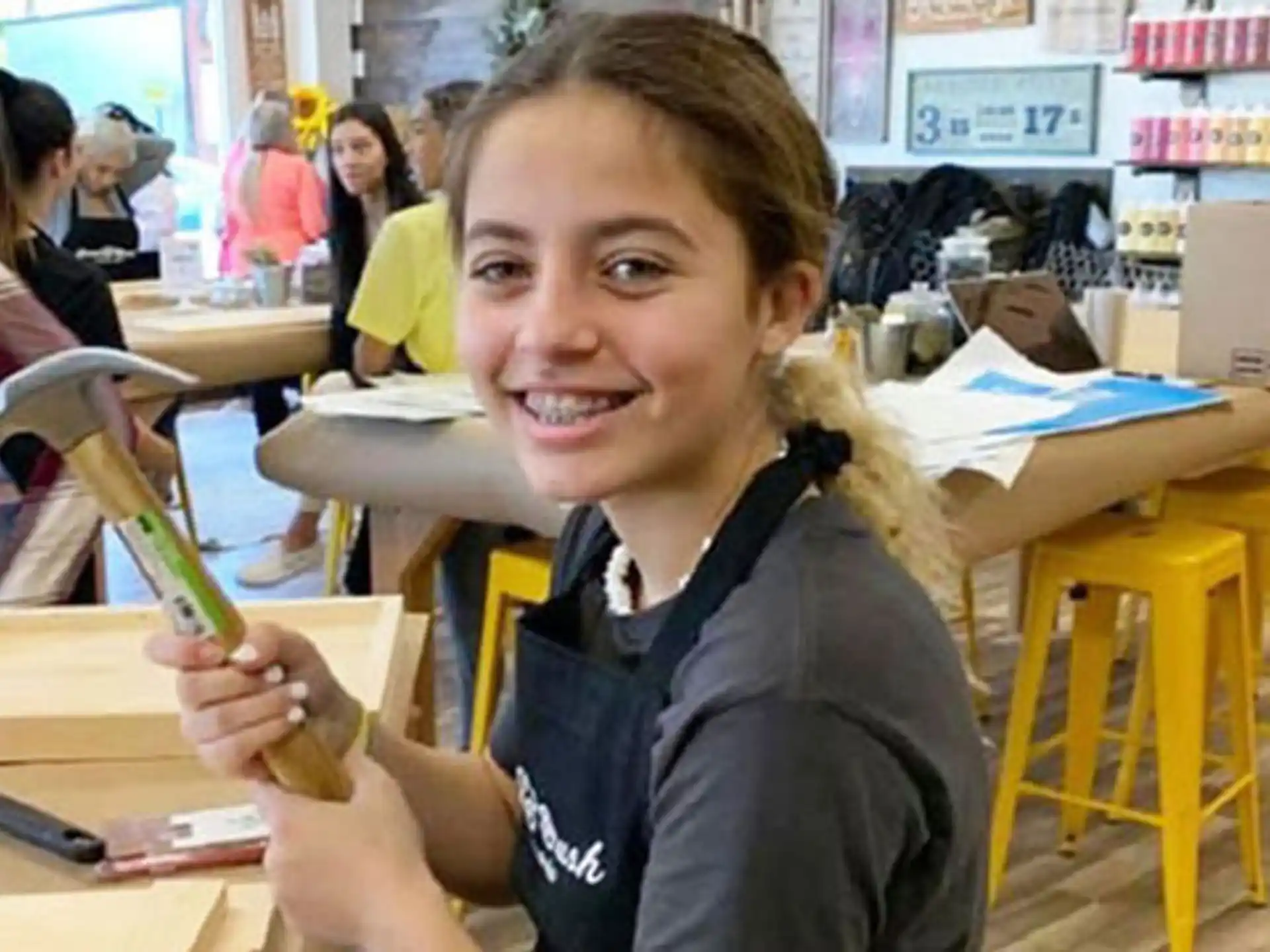 a girl smiling at the camera