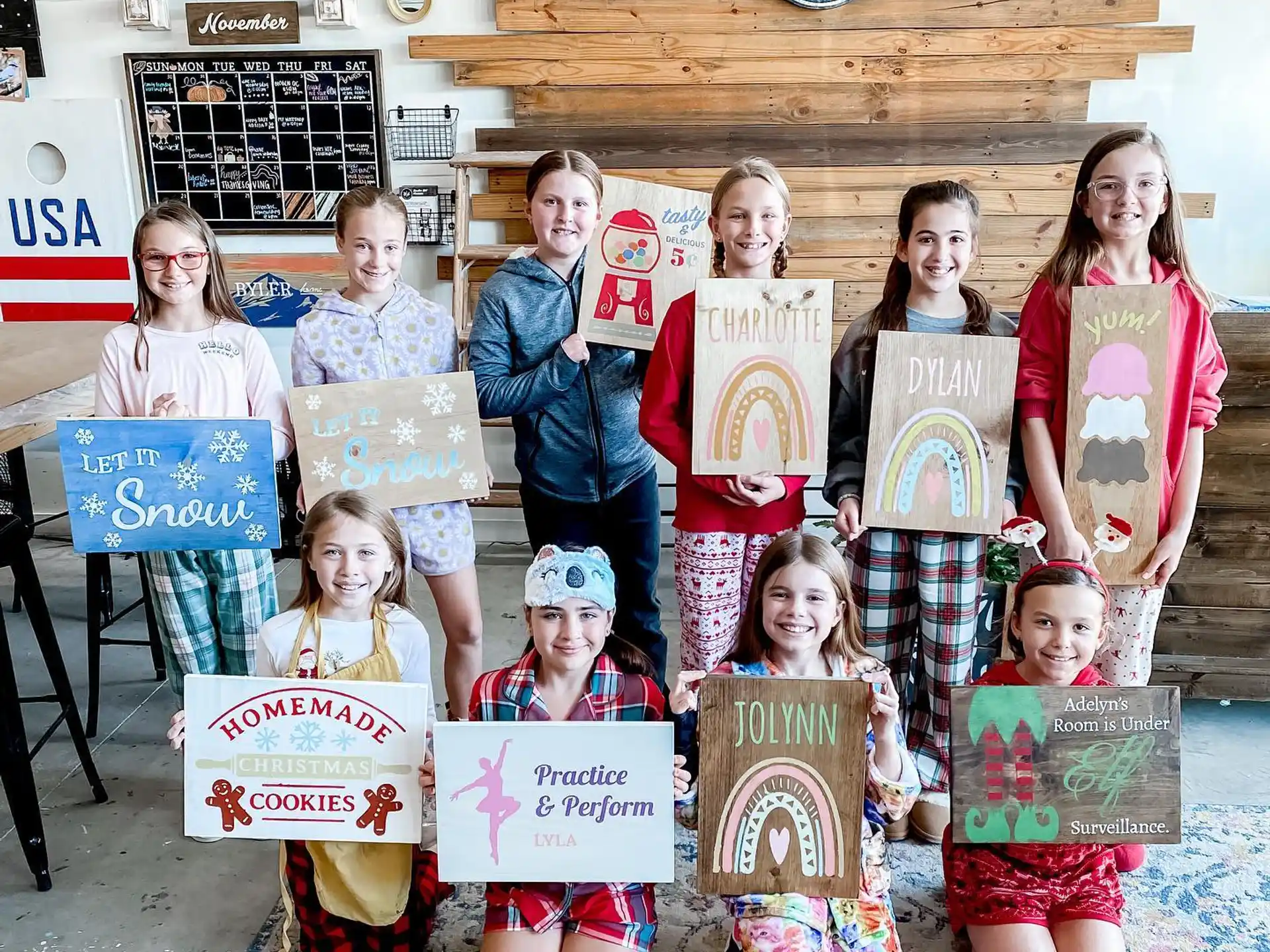 a group of children holding signs
