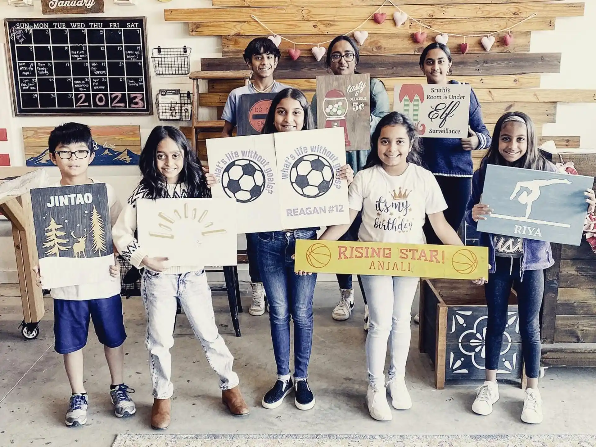 a group of people holding signs