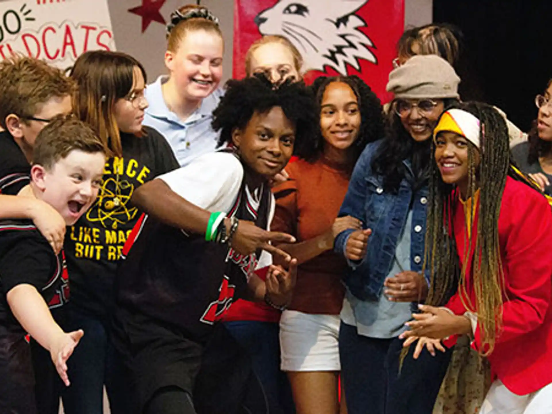 a group of people posing for a photo