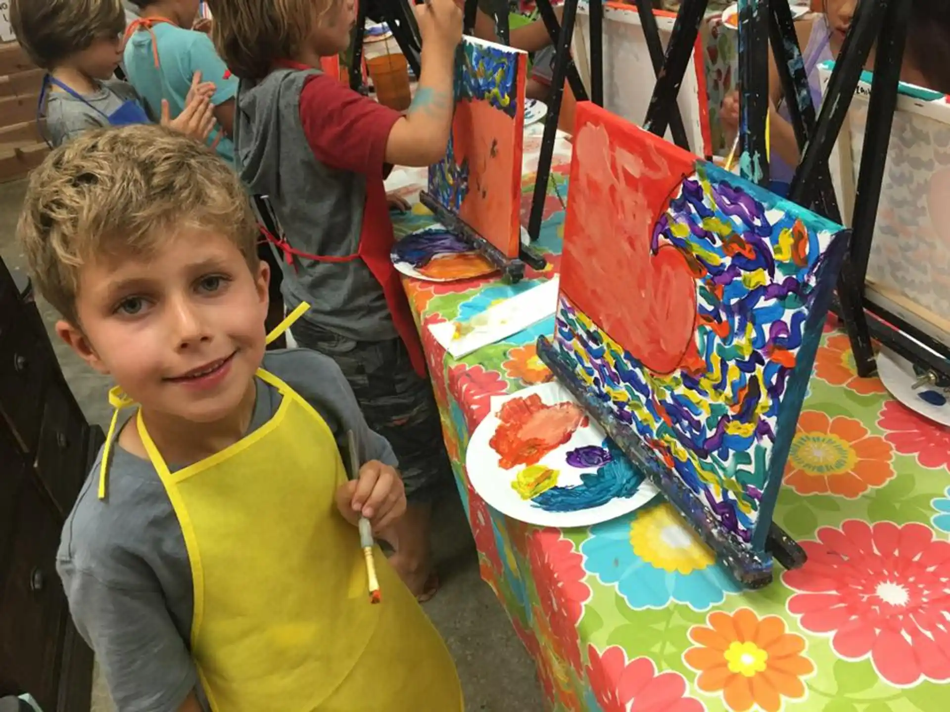 a boy holding a kite