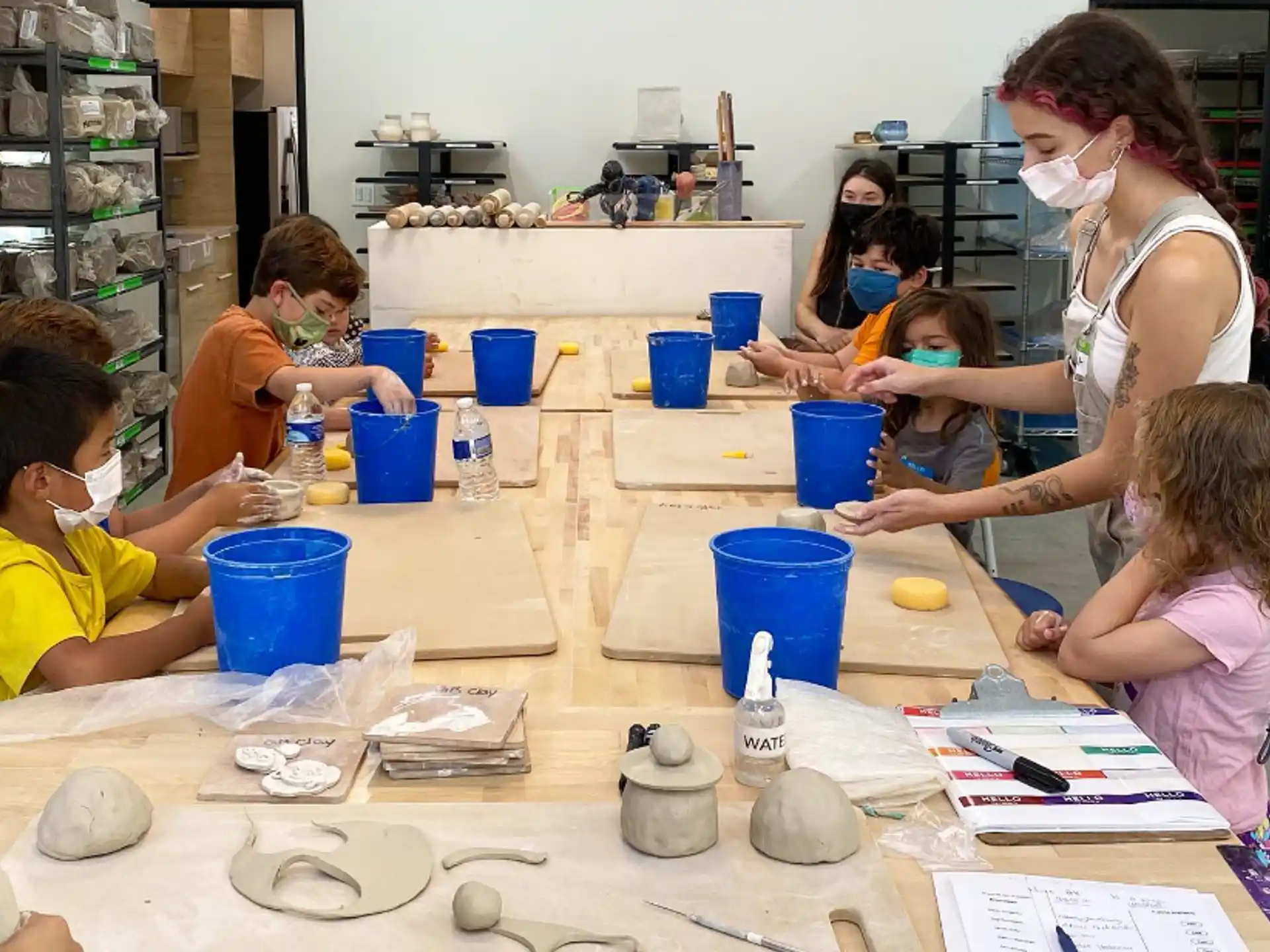 a group of children painting