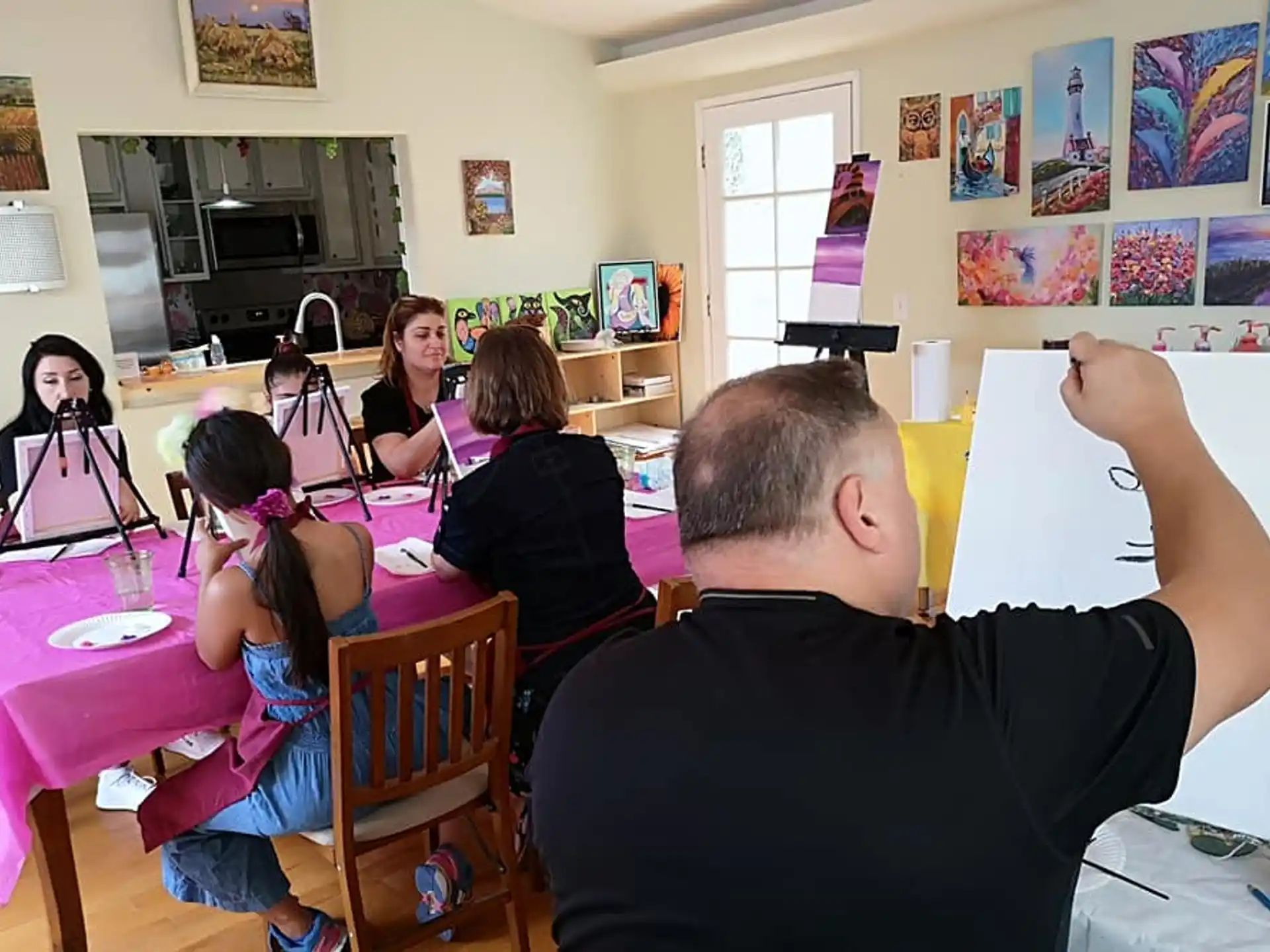a group of people sitting at a table