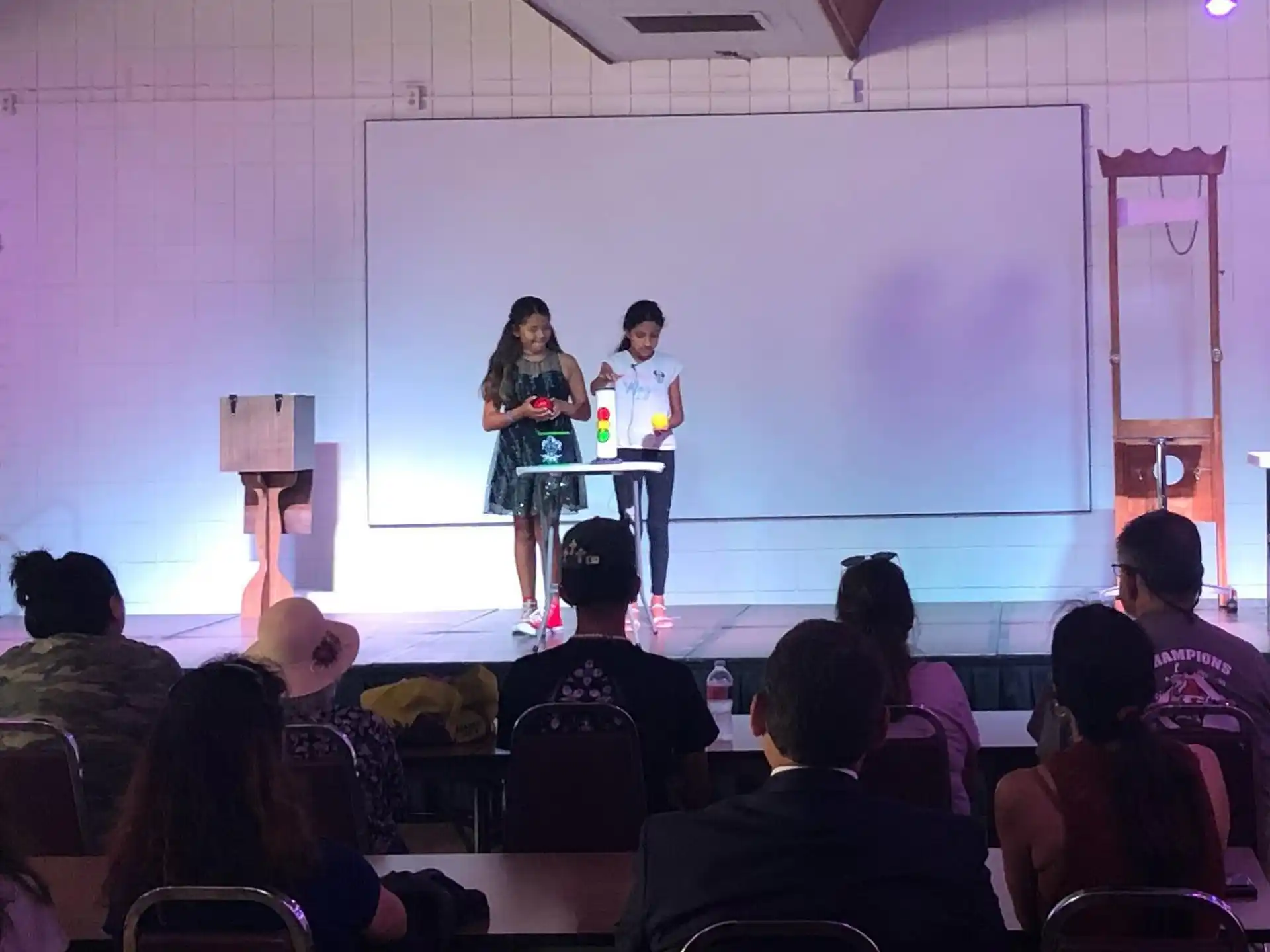 a group of people on a stage