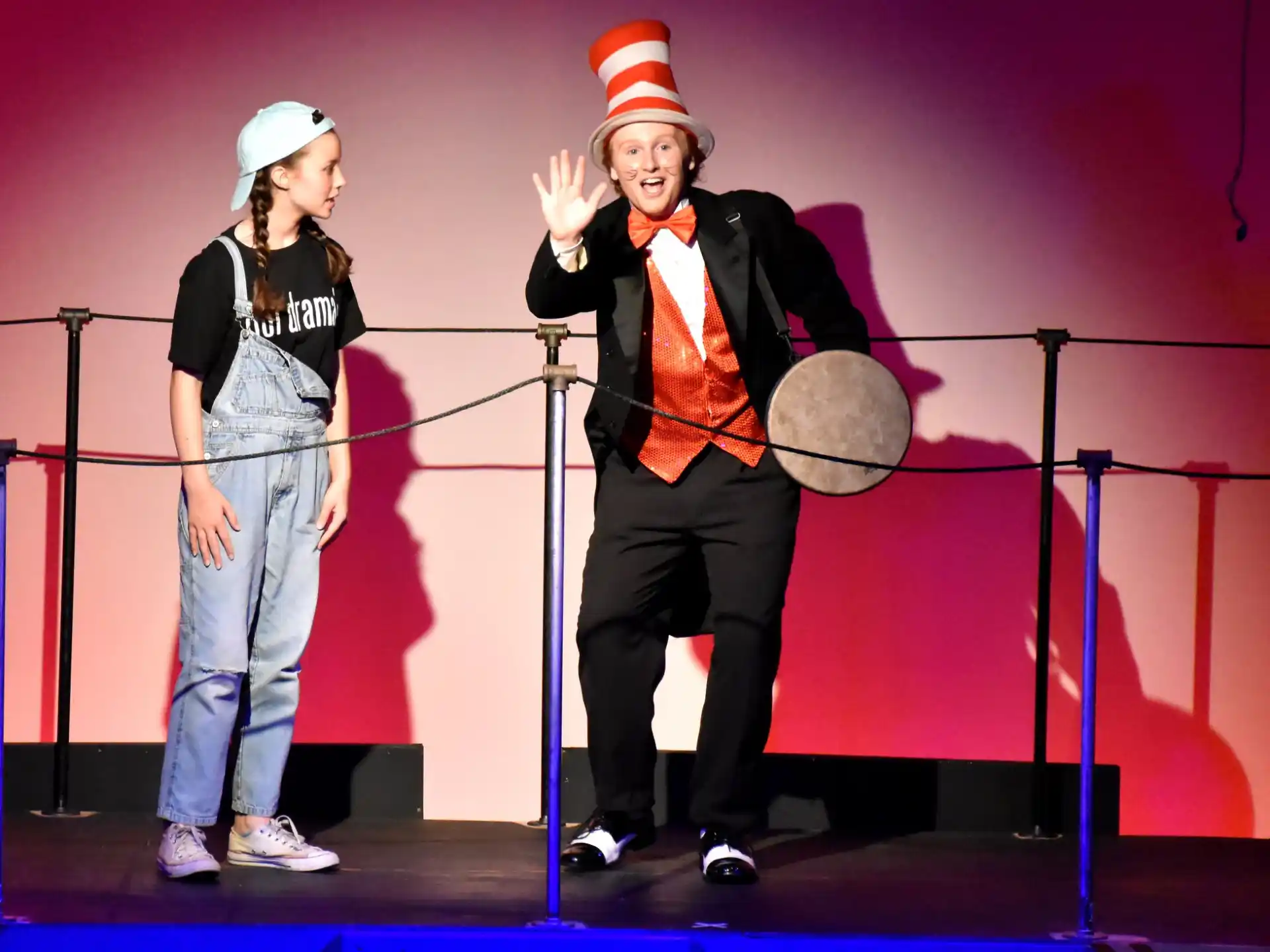 a man and a woman on a stage