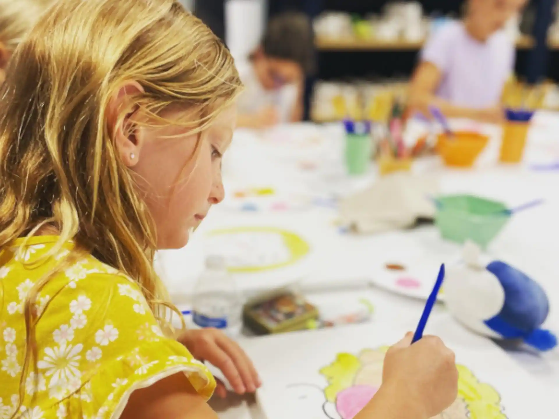 a young girl painting