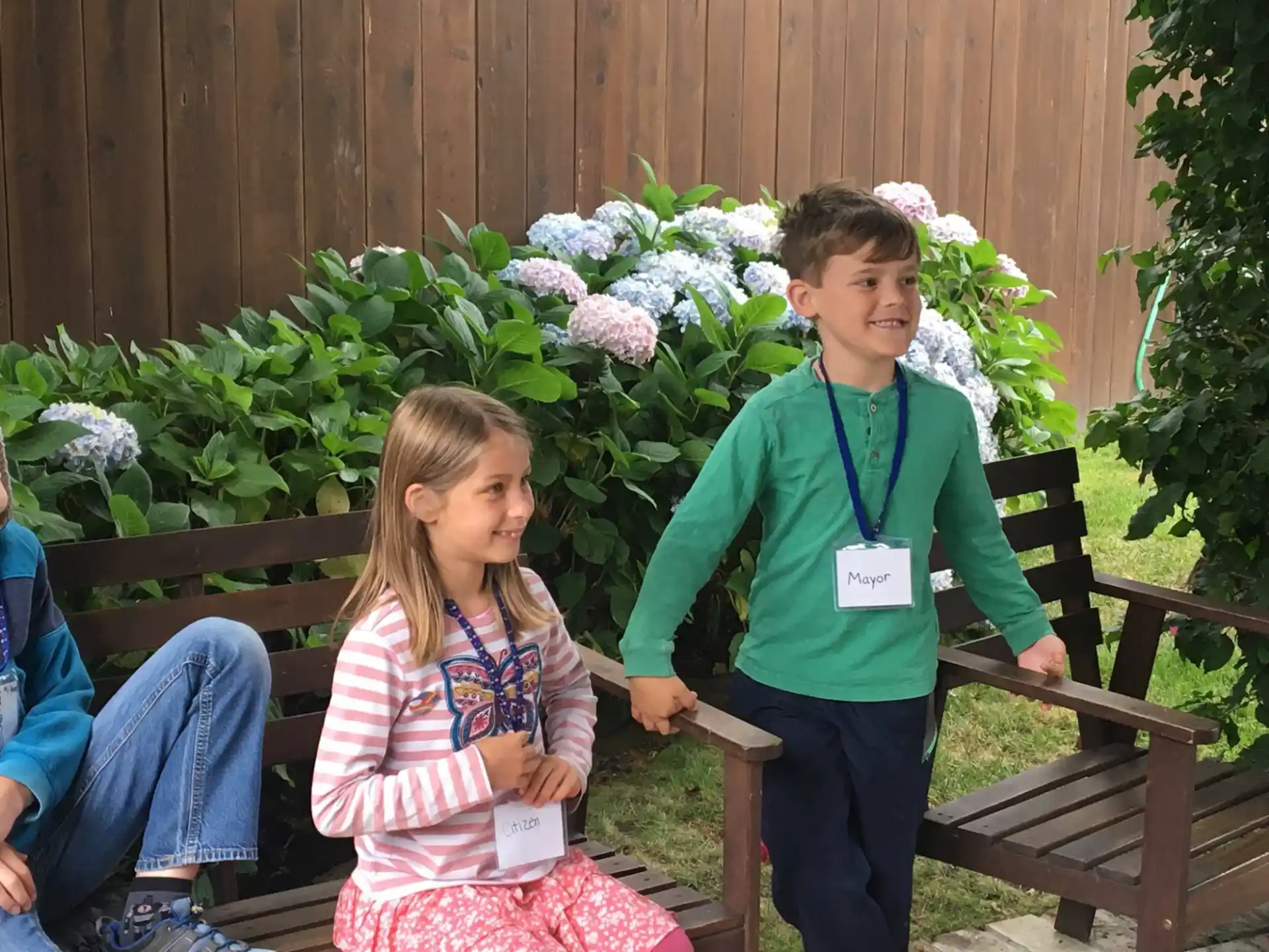 a boy and girl posing for a picture