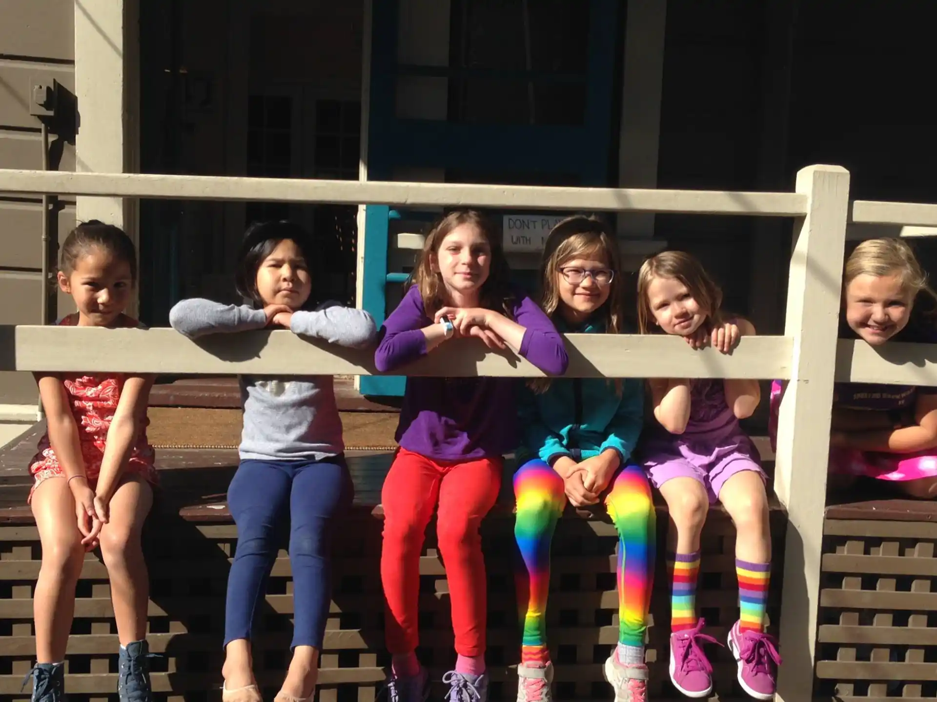 a group of children posing for a photo