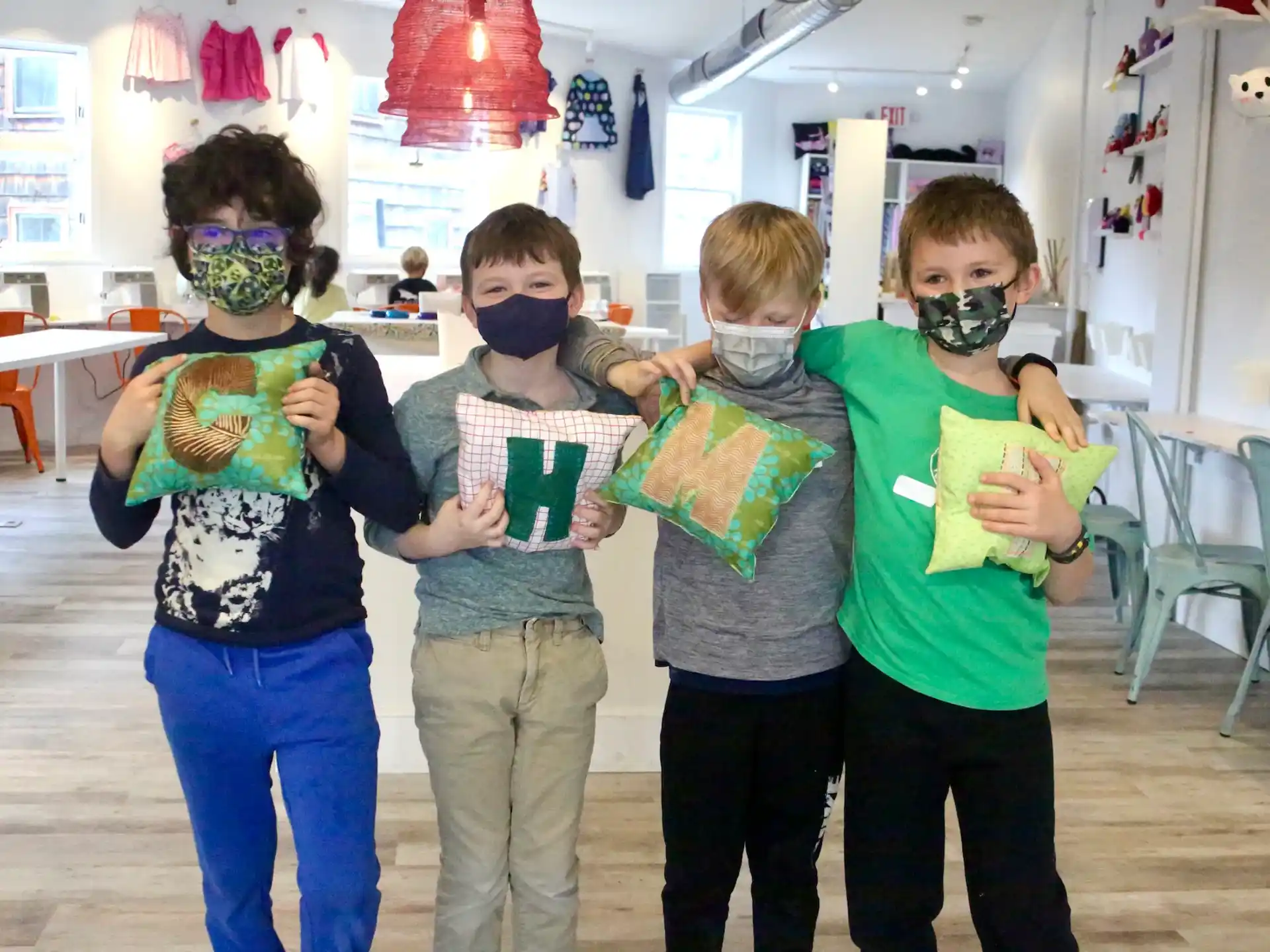 a group of kids wearing masks