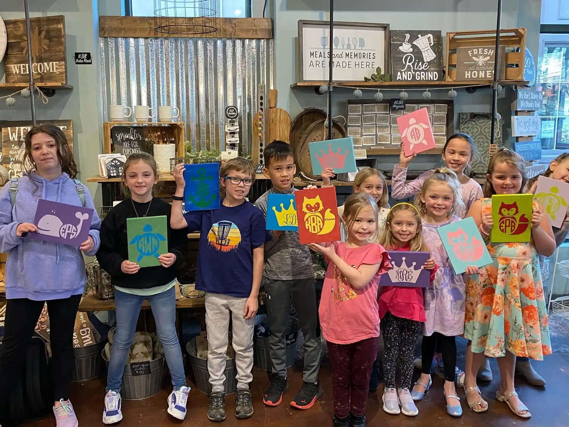 a group of children holding signs