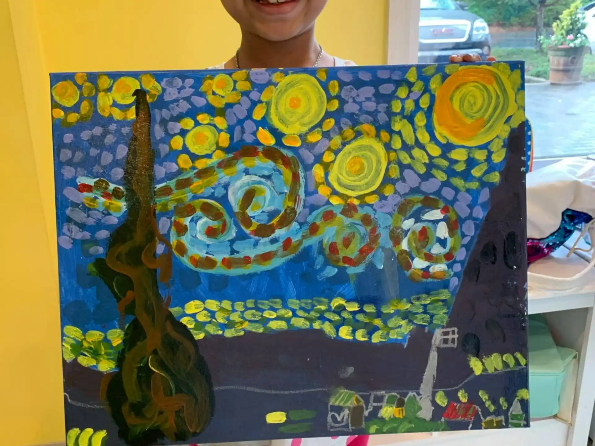 a child wearing a colorful shirt