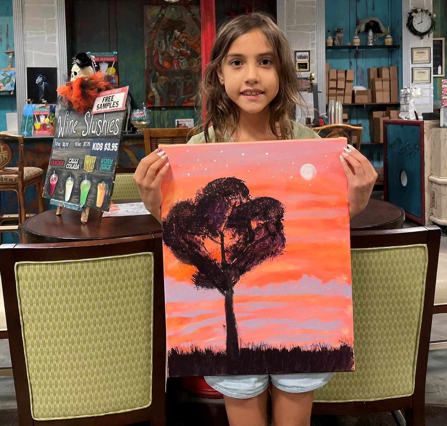 a girl holding a book