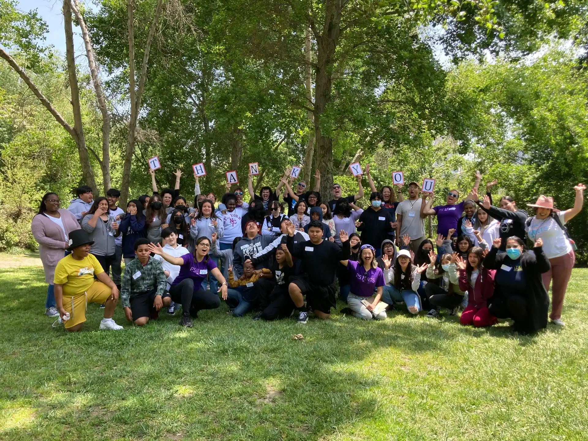 a group of people posing for a photo