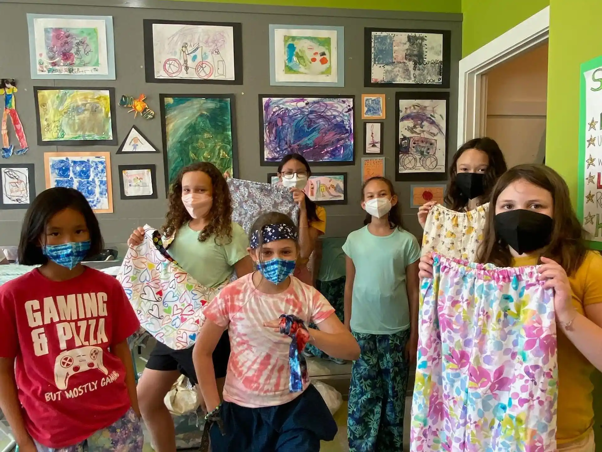 a group of people wearing masks