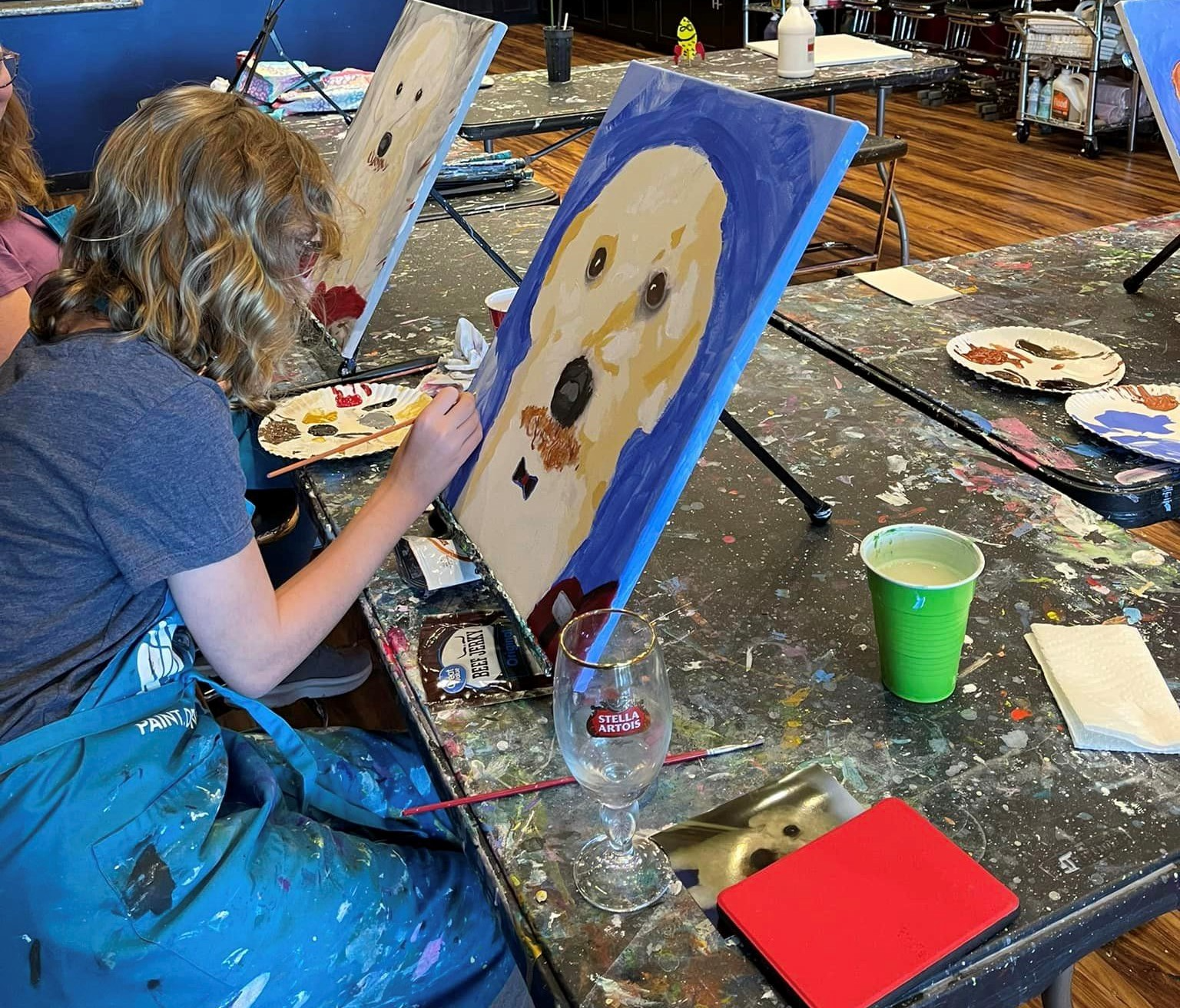 a person painting on a table