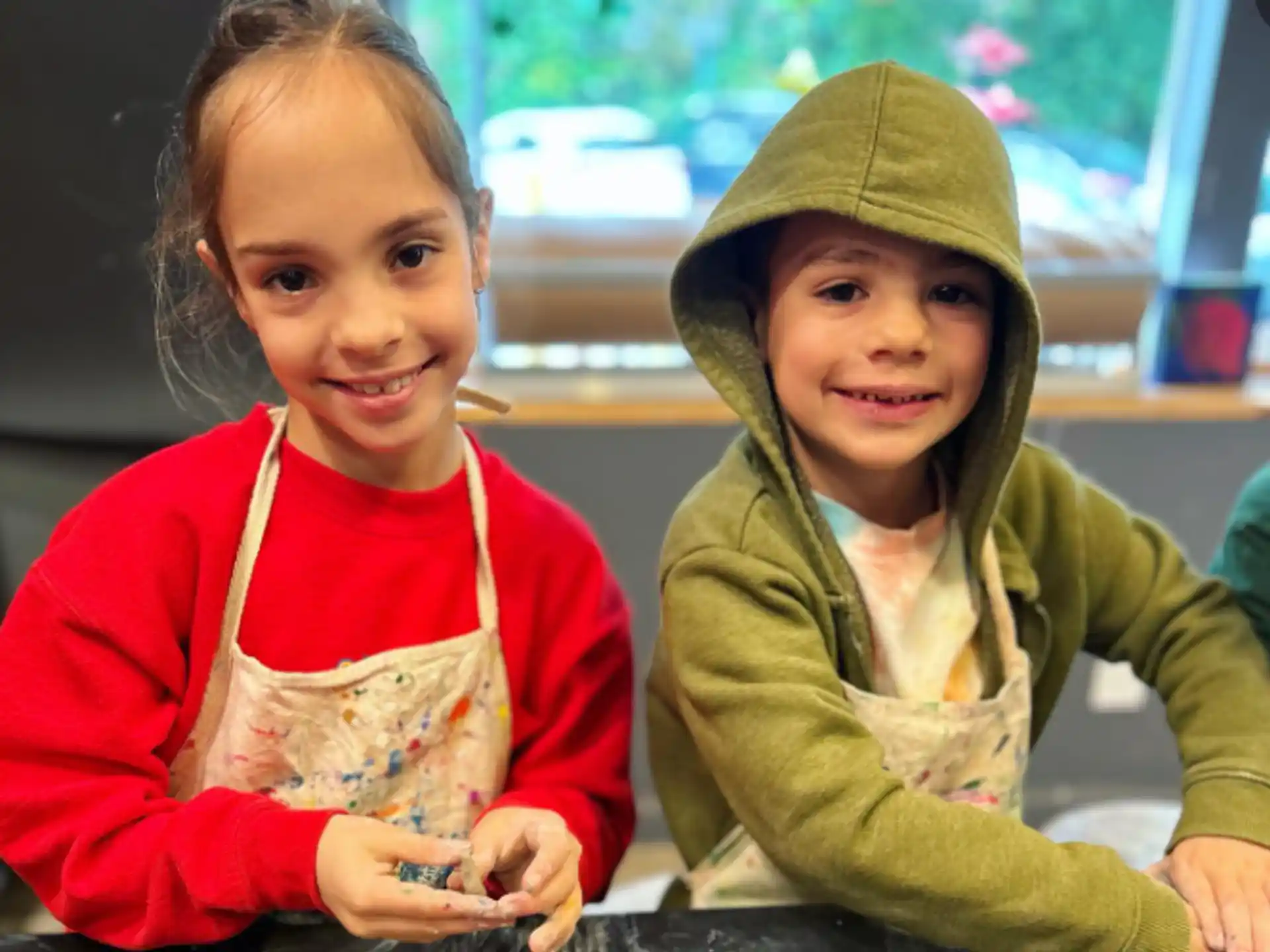 a couple of children posing for the camera