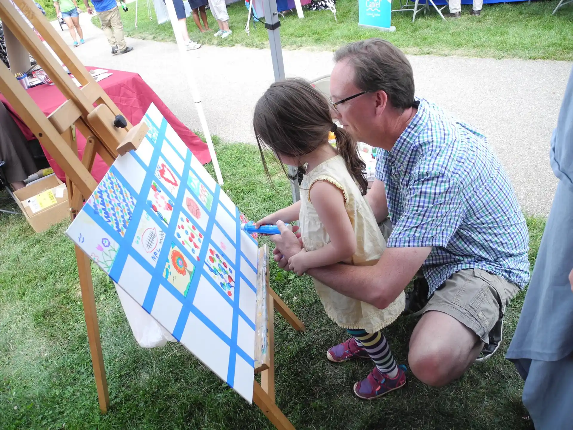 a man and a woman painting