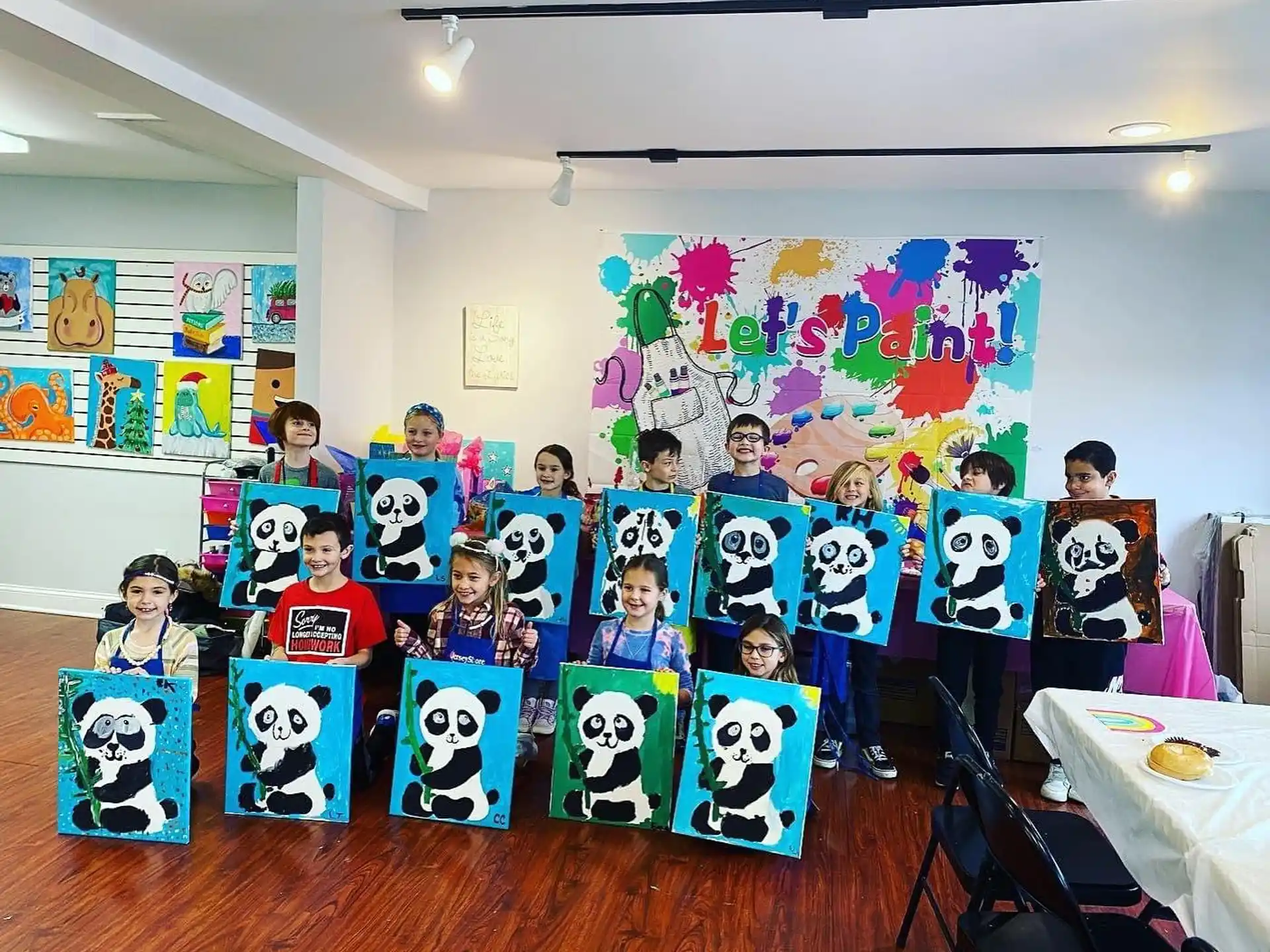 a group of children holding signs