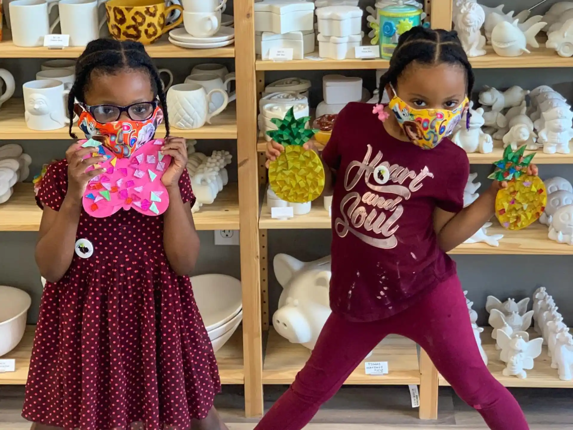 a couple of children wearing clothing