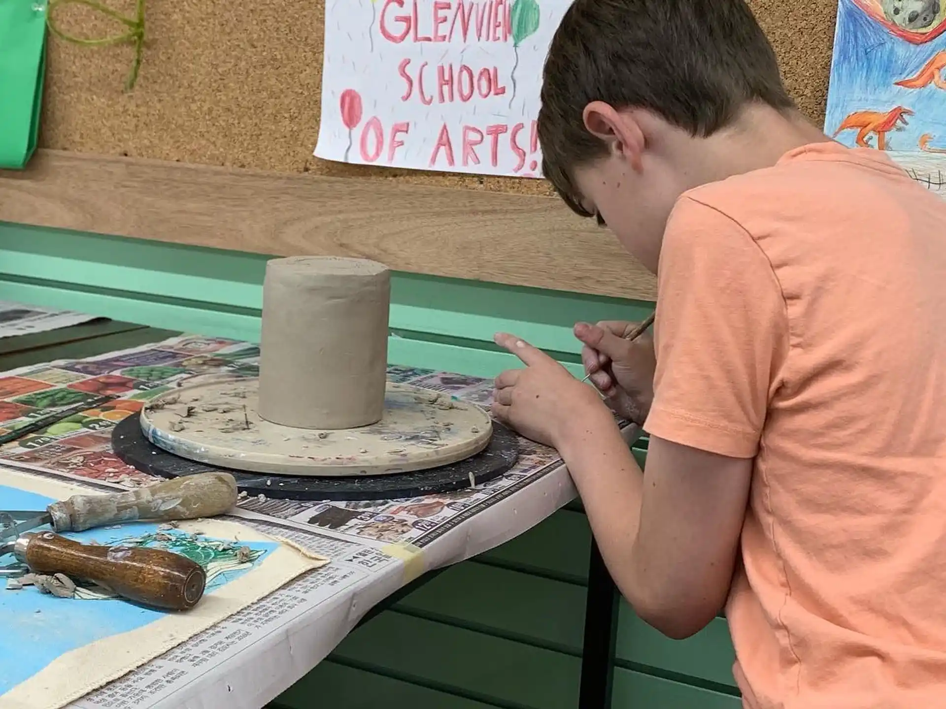 a man painting a picture