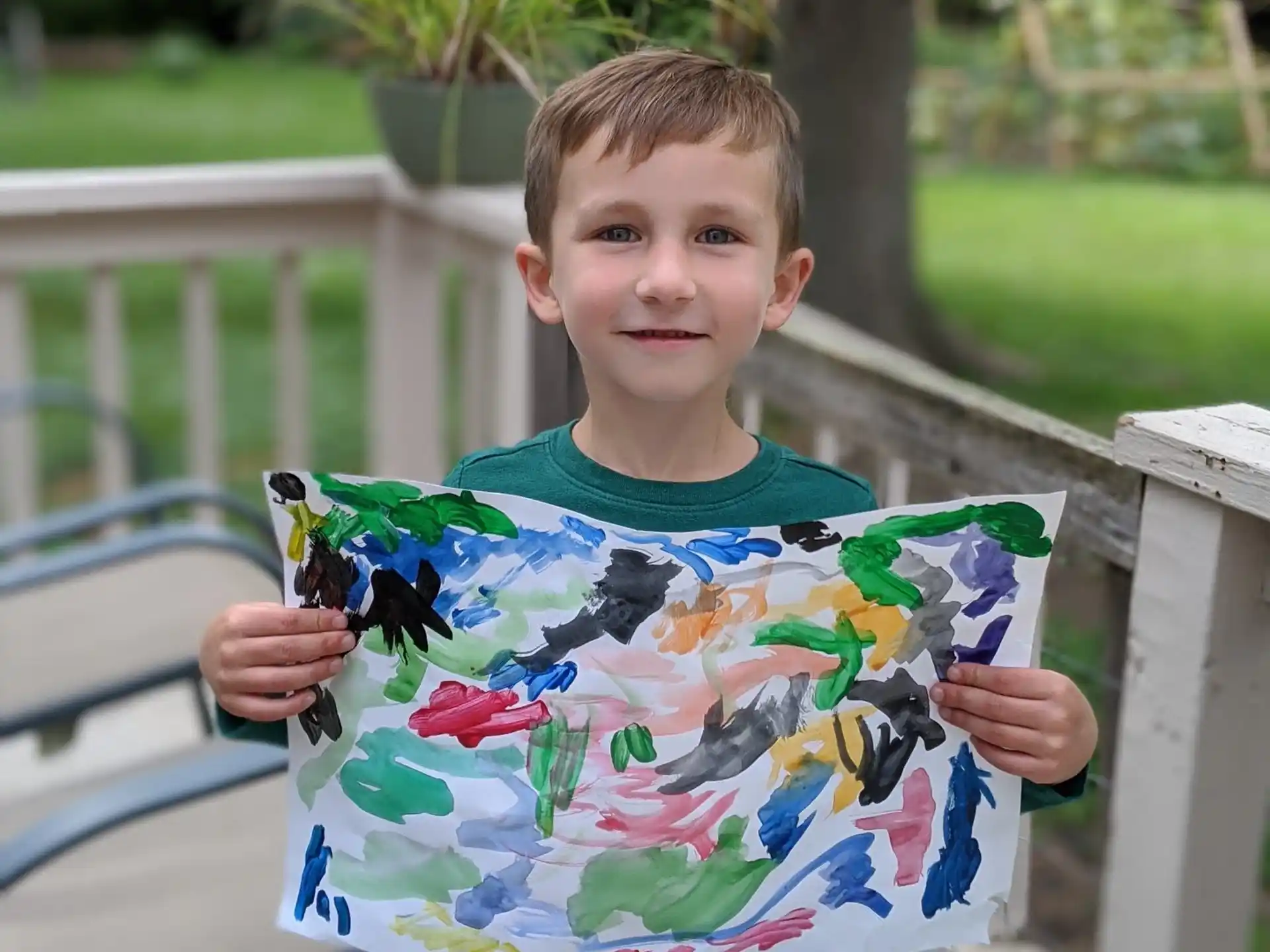 a boy holding a sign