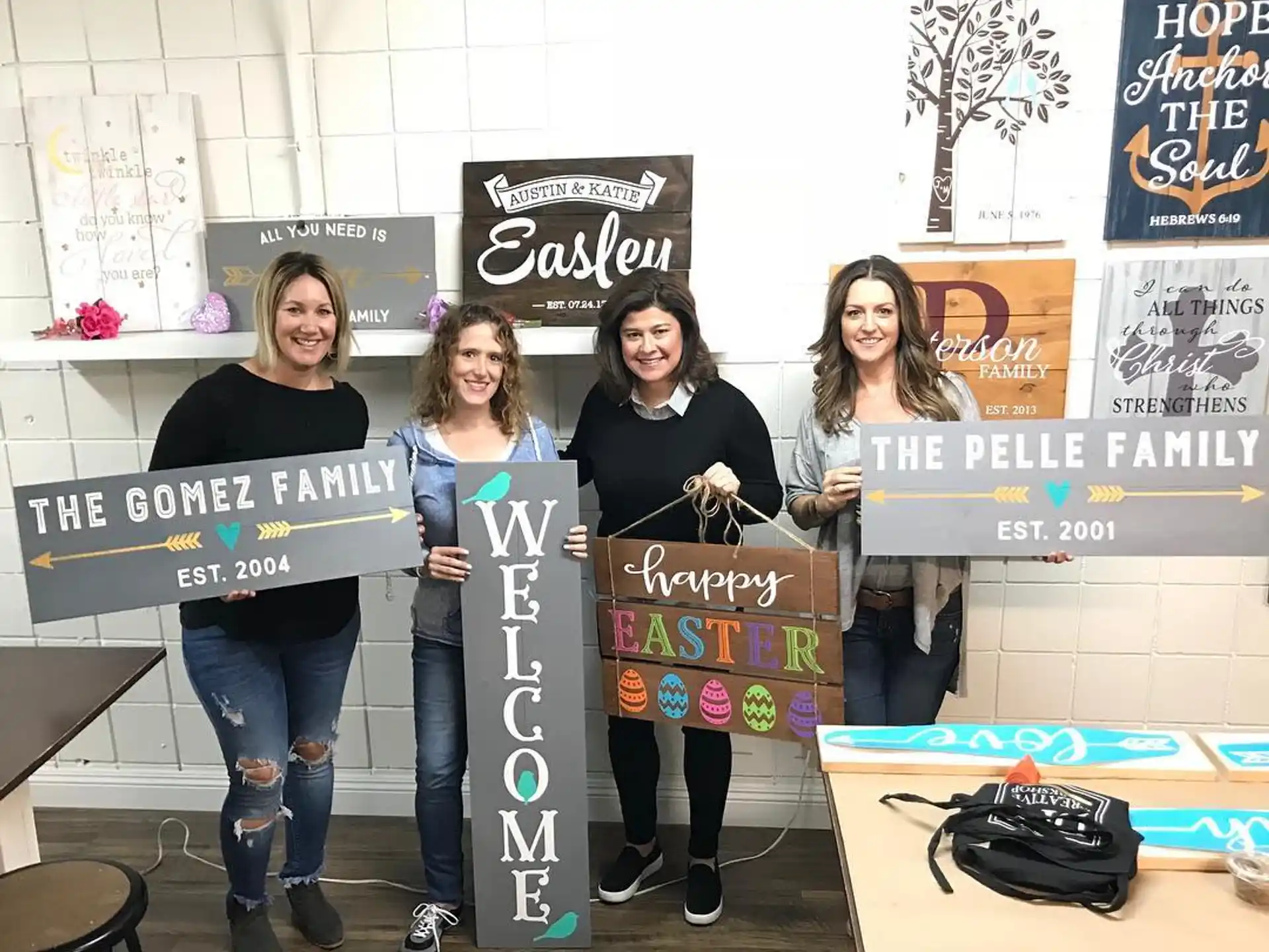 a group of women holding signs