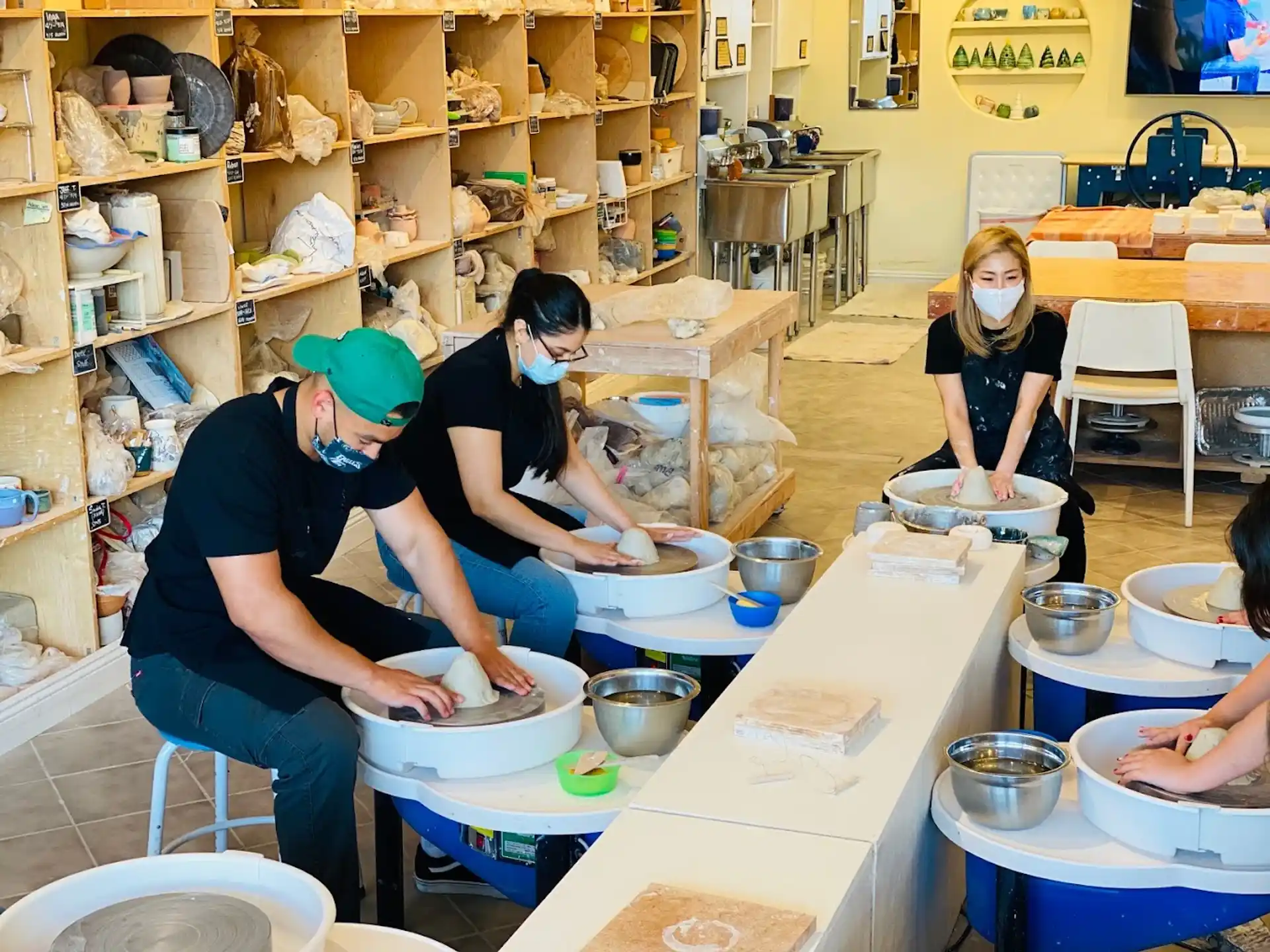 a group of people in a kitchen