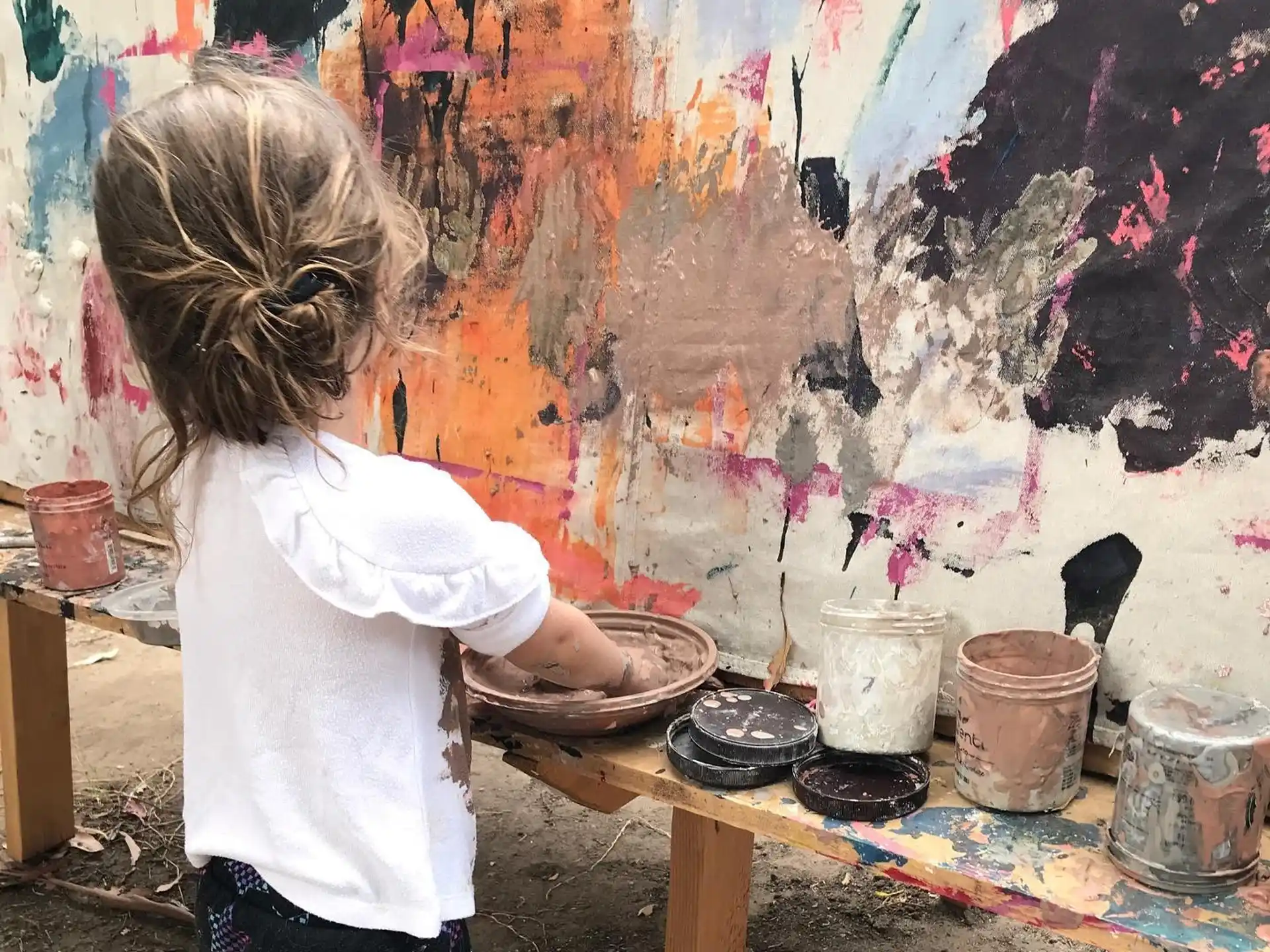 a person painting a wall