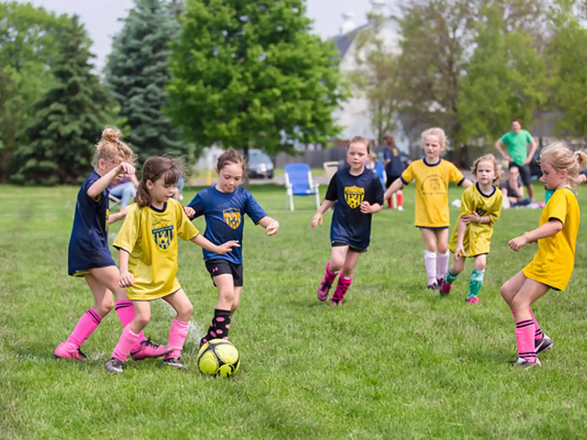 a group of kids playing football