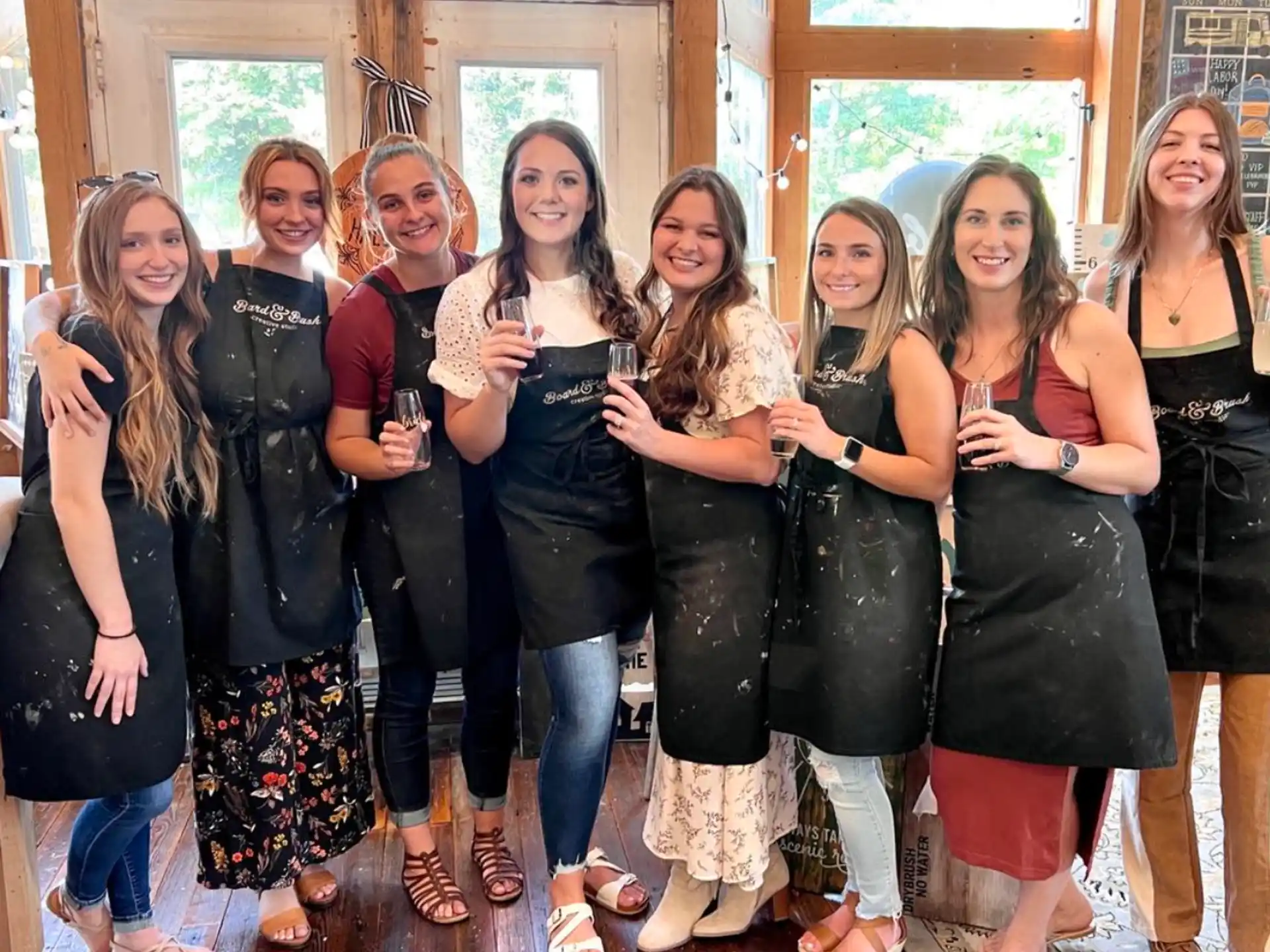 a group of women posing for a photo